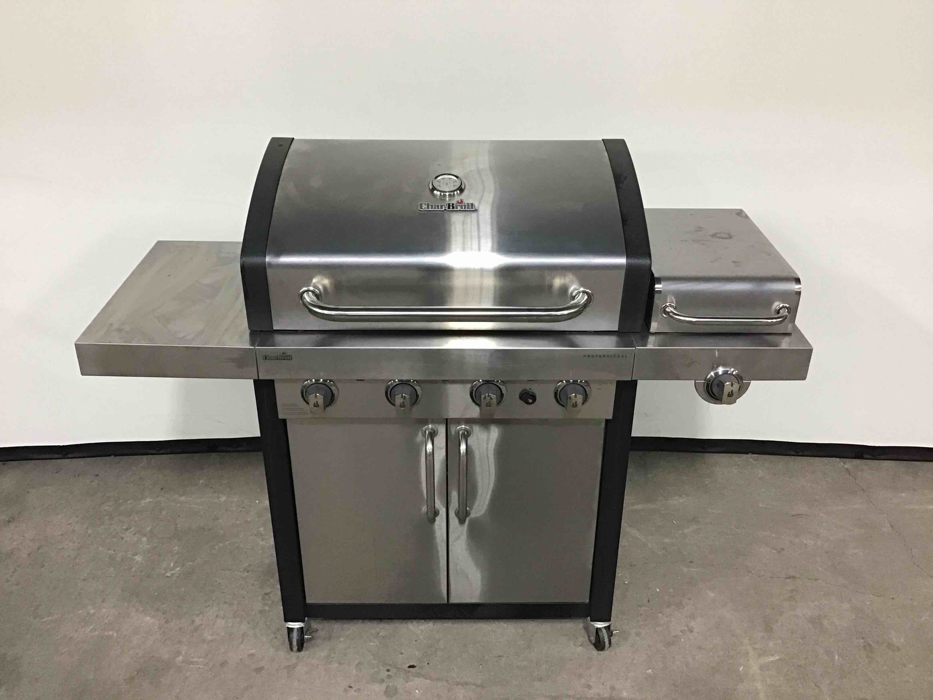2016 CHARBROIL STAINLESS STEEL PROPANE GRILL WITH SIDE PLATE ON CASTERS