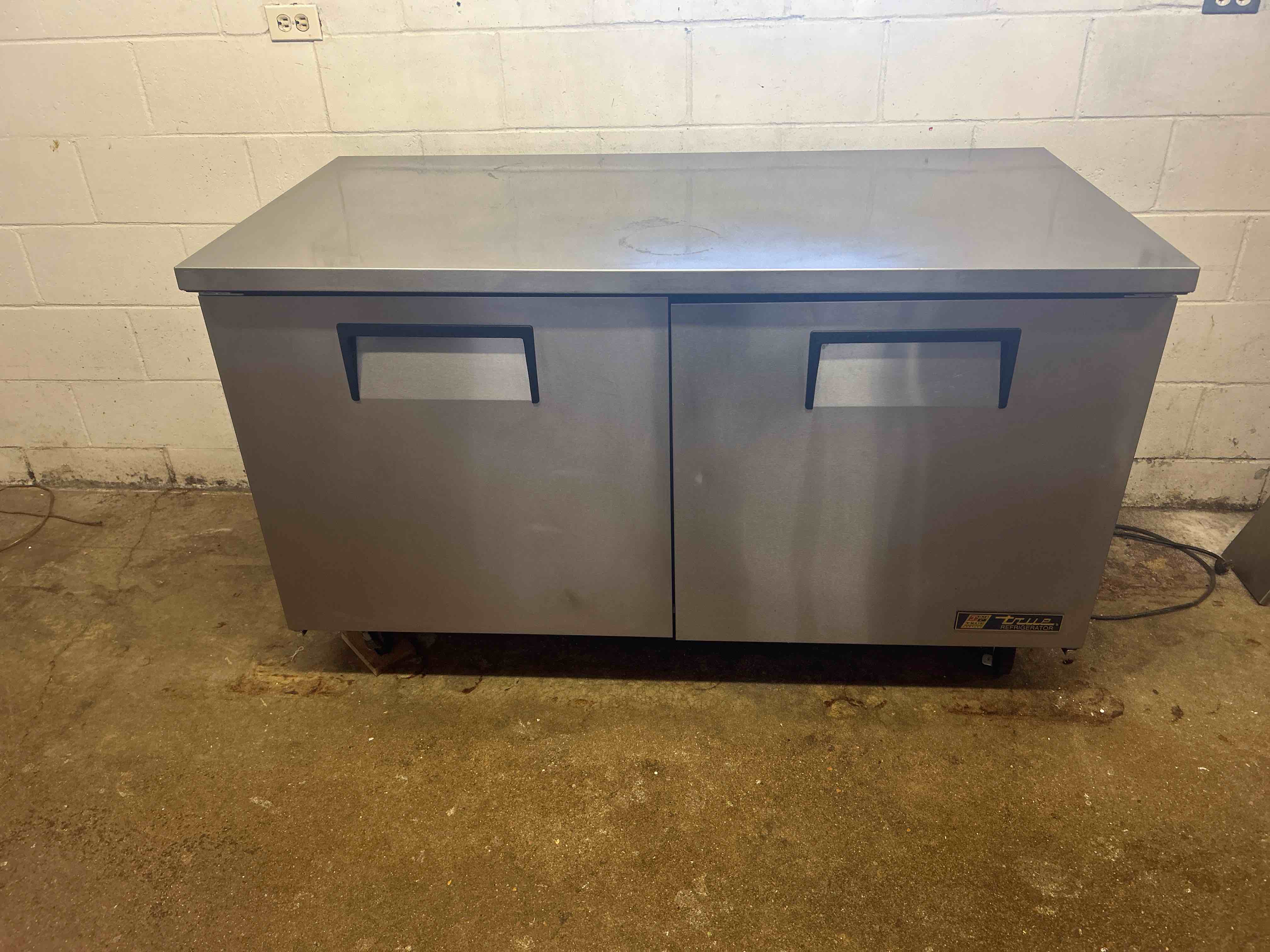 2016 TRUE 60 INCH STAINLESS STEEL 2 DOOR UNDERCOUNTER REFRIGERATOR ON CASTERS