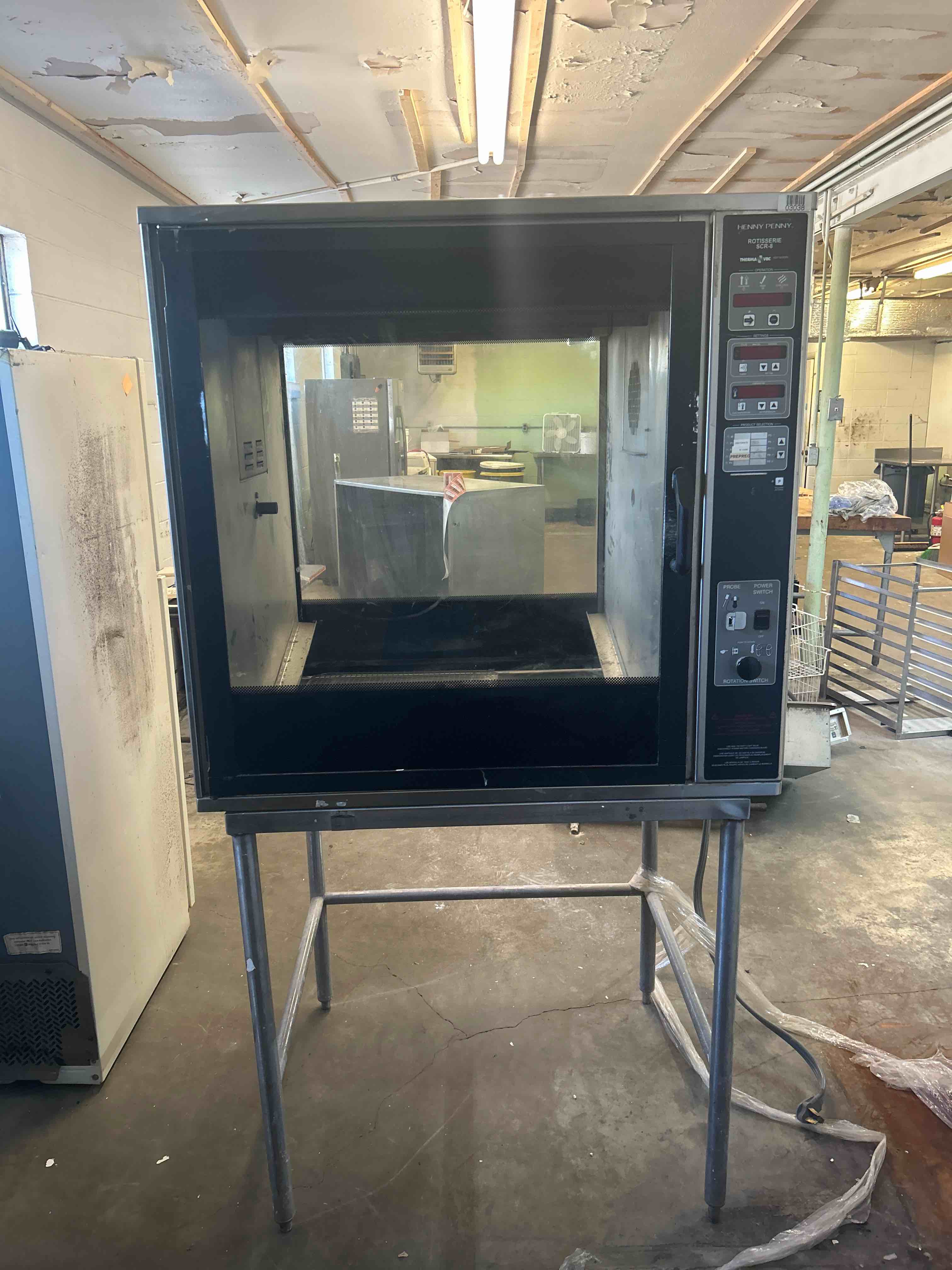 HENNY PENNY COUNTERTOP PASS THRU ROTISSERIE OVEN ON EQUIPMENT STAND