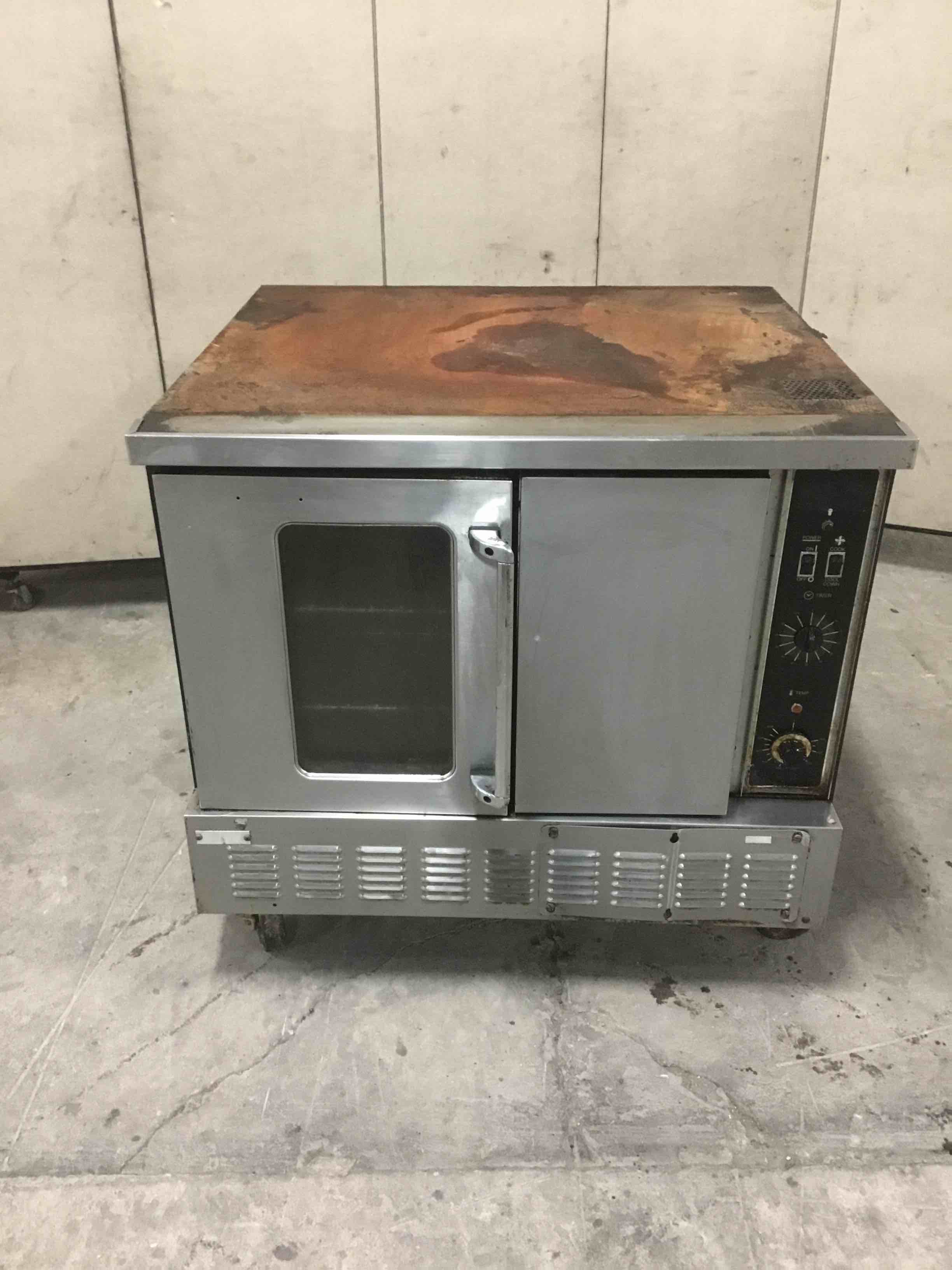 GARLAND STAINLESS STEEL FULL SIZE NATURAL GAS CONVECTION OVEN ON CASTERS 