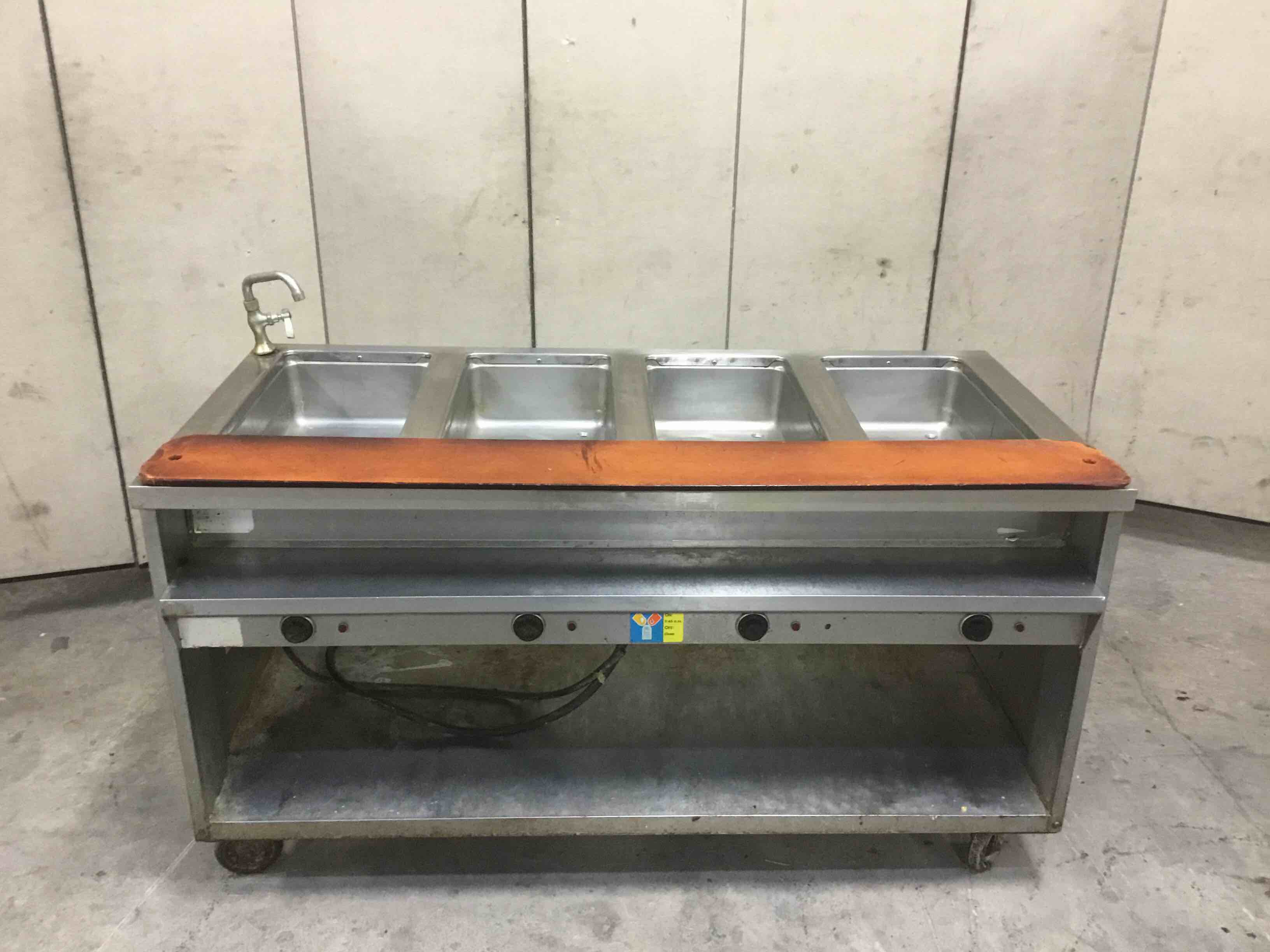 RANDELL 4-WELL STEAM TABLE WITH FAUCET AND UNDER SHELF CASTERS 
