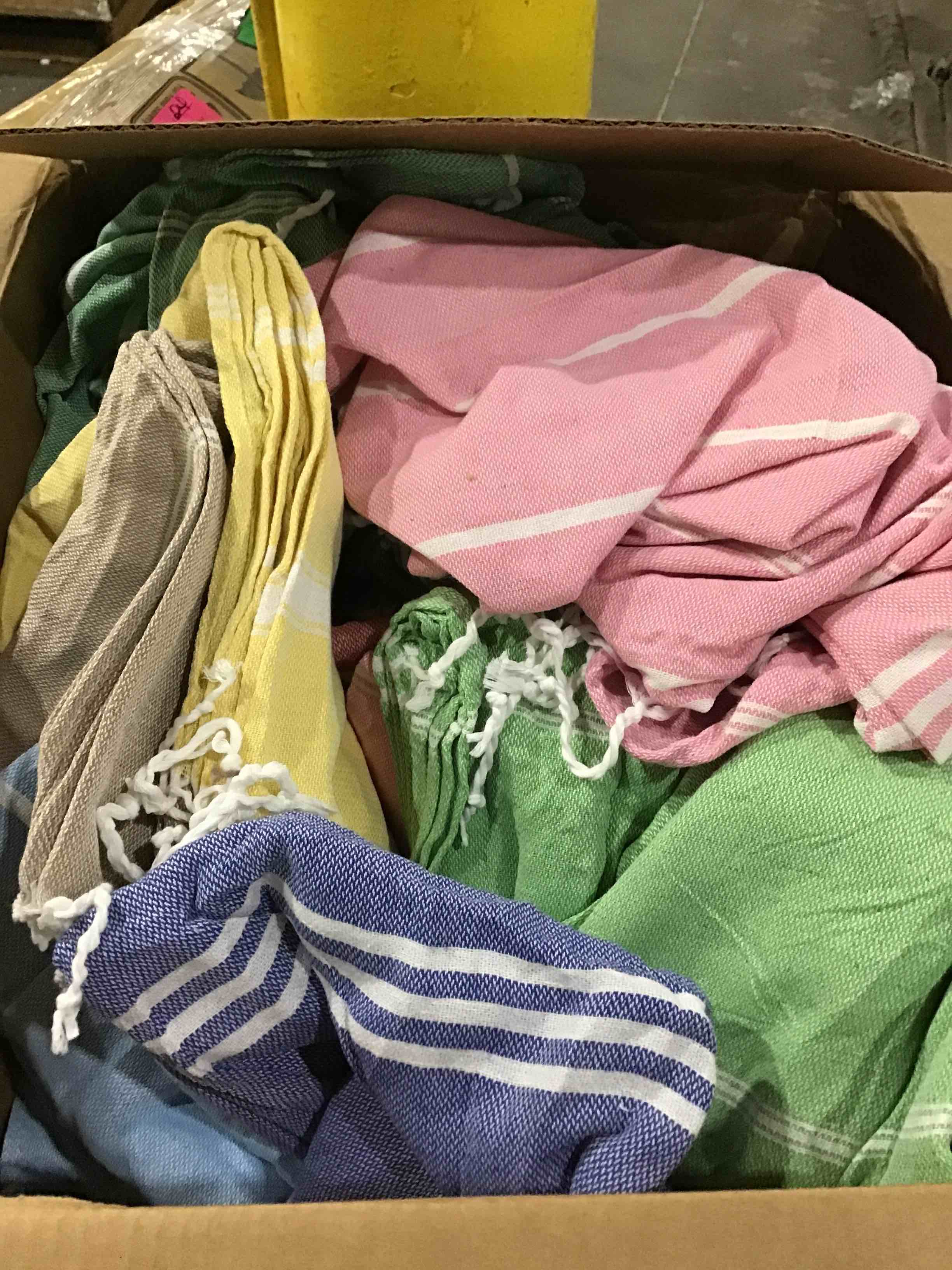 BOX OF ASSORTED COLORED SMALL BLANKETS
