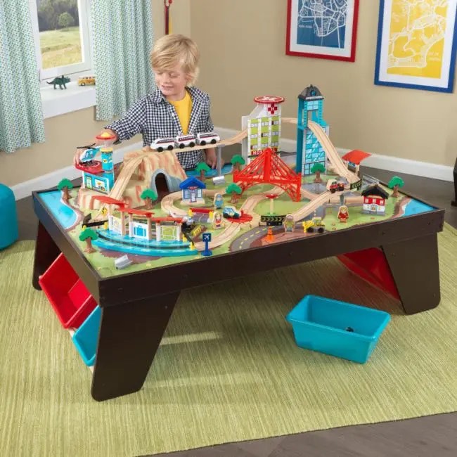 KidKraft Aero City Wooden Train Set & Table with 80-Pieces and 4 Storage Bins, Espresso