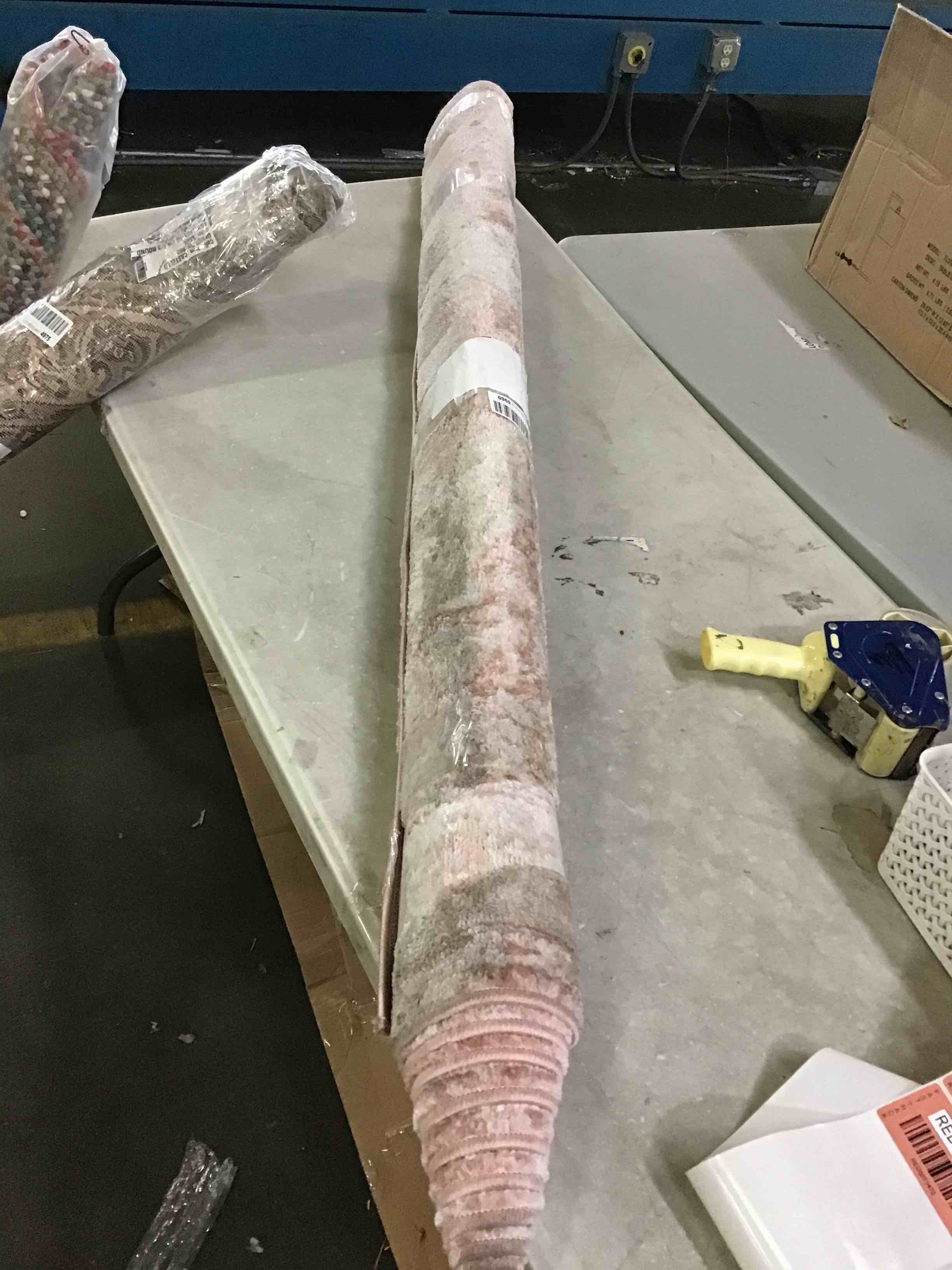 dirty pink fuzzy rug 