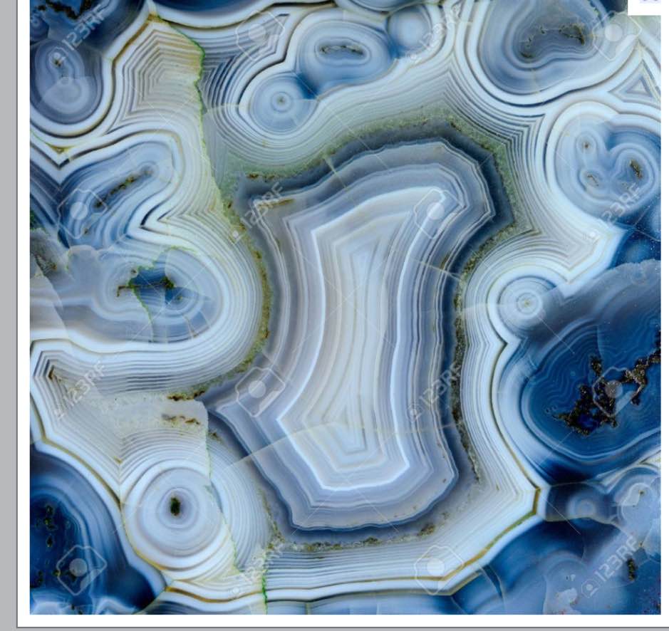 Backgrounds and textures: surface of beautiful blue-grey decorative stone, abstract pattern of cracks, spots and stains, natural background