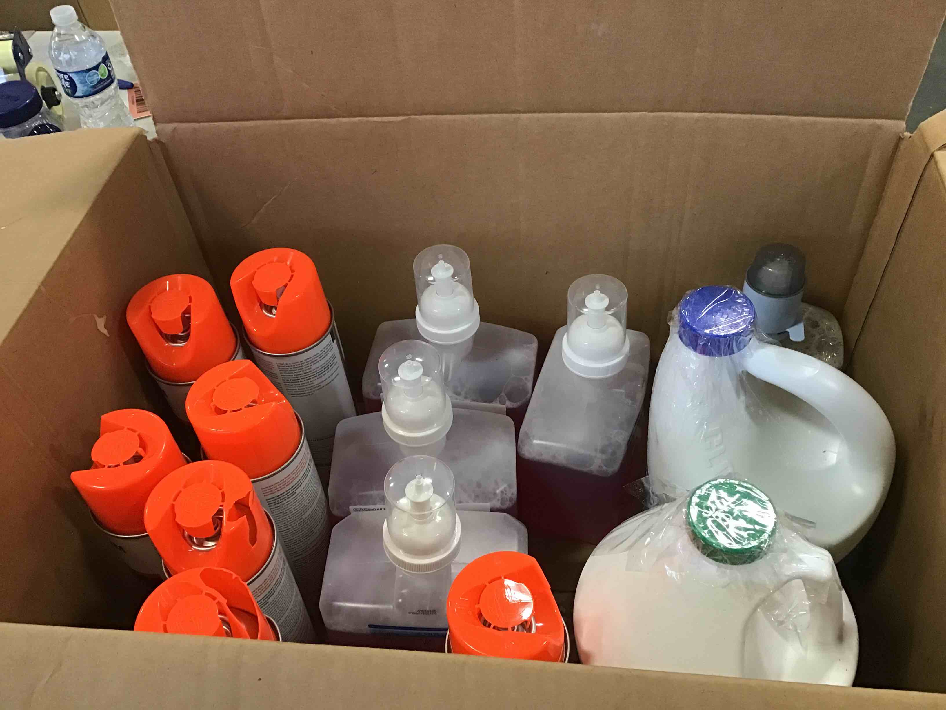 Assorted liquids for cleaning bathrooms and carpets 14 units 