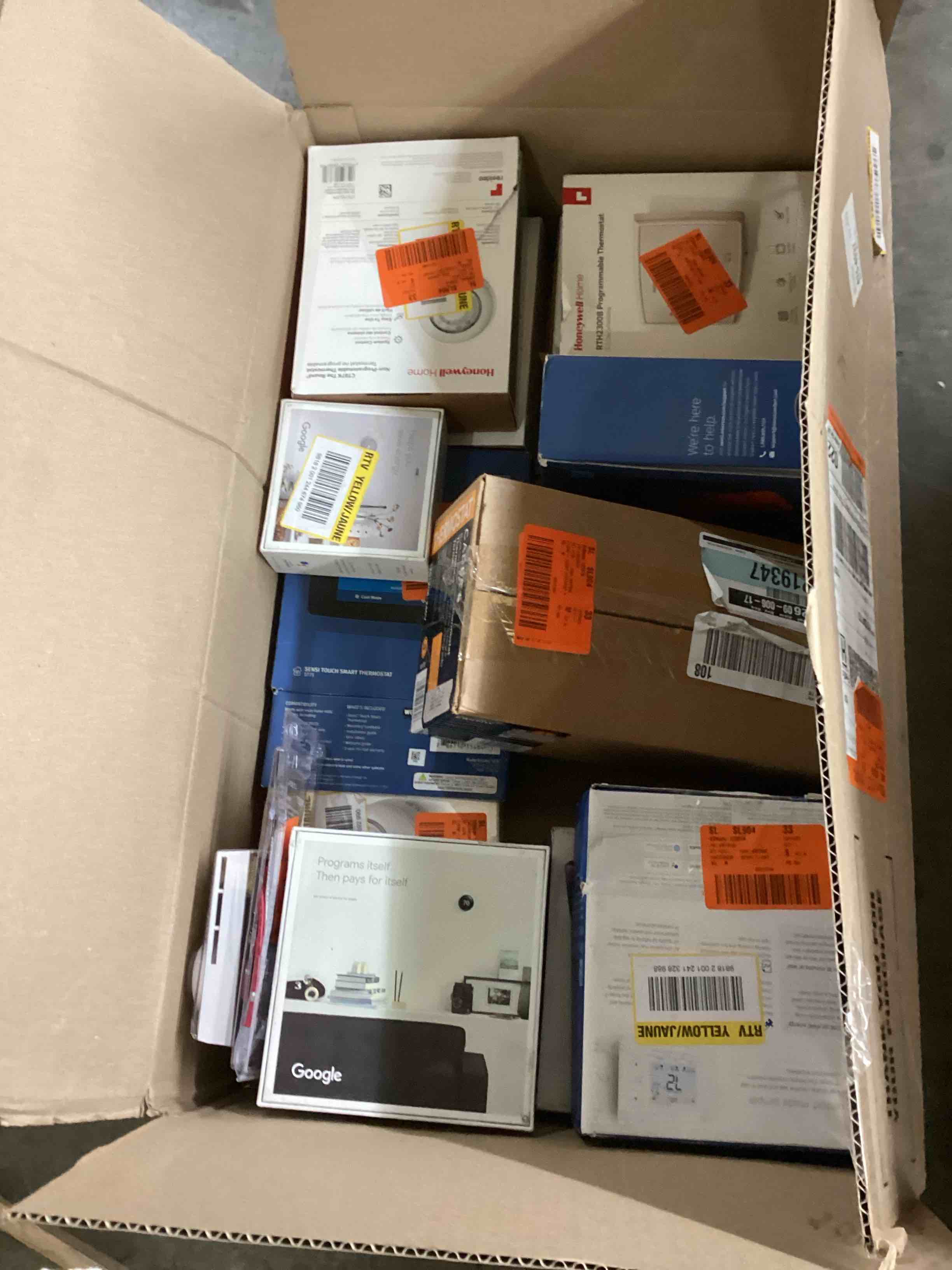 Assorted Box of Smart a thermostats.