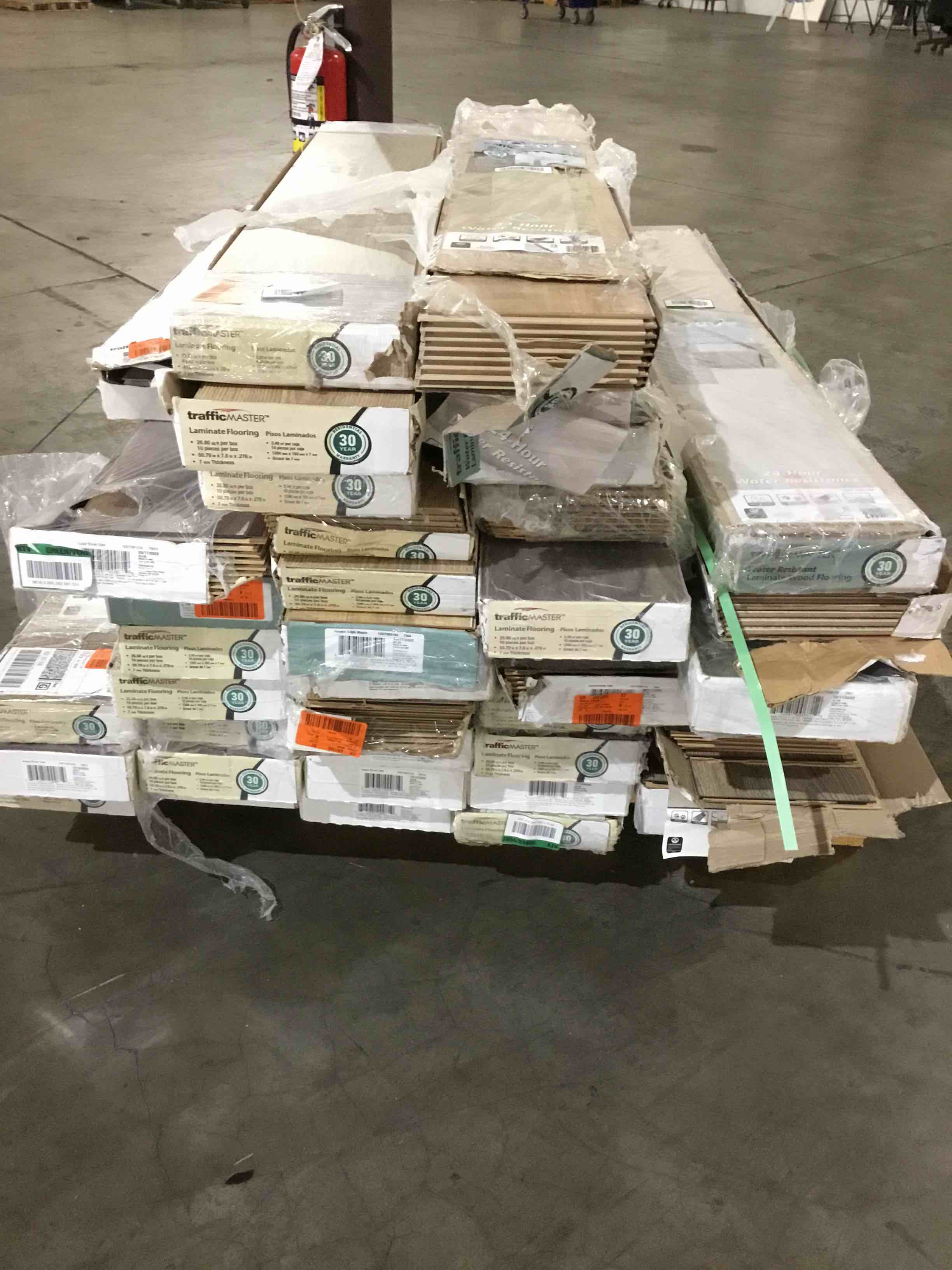 Assorted Skid of Laminate Flooring Planks, 40 Boxes, Your Bid per Box.