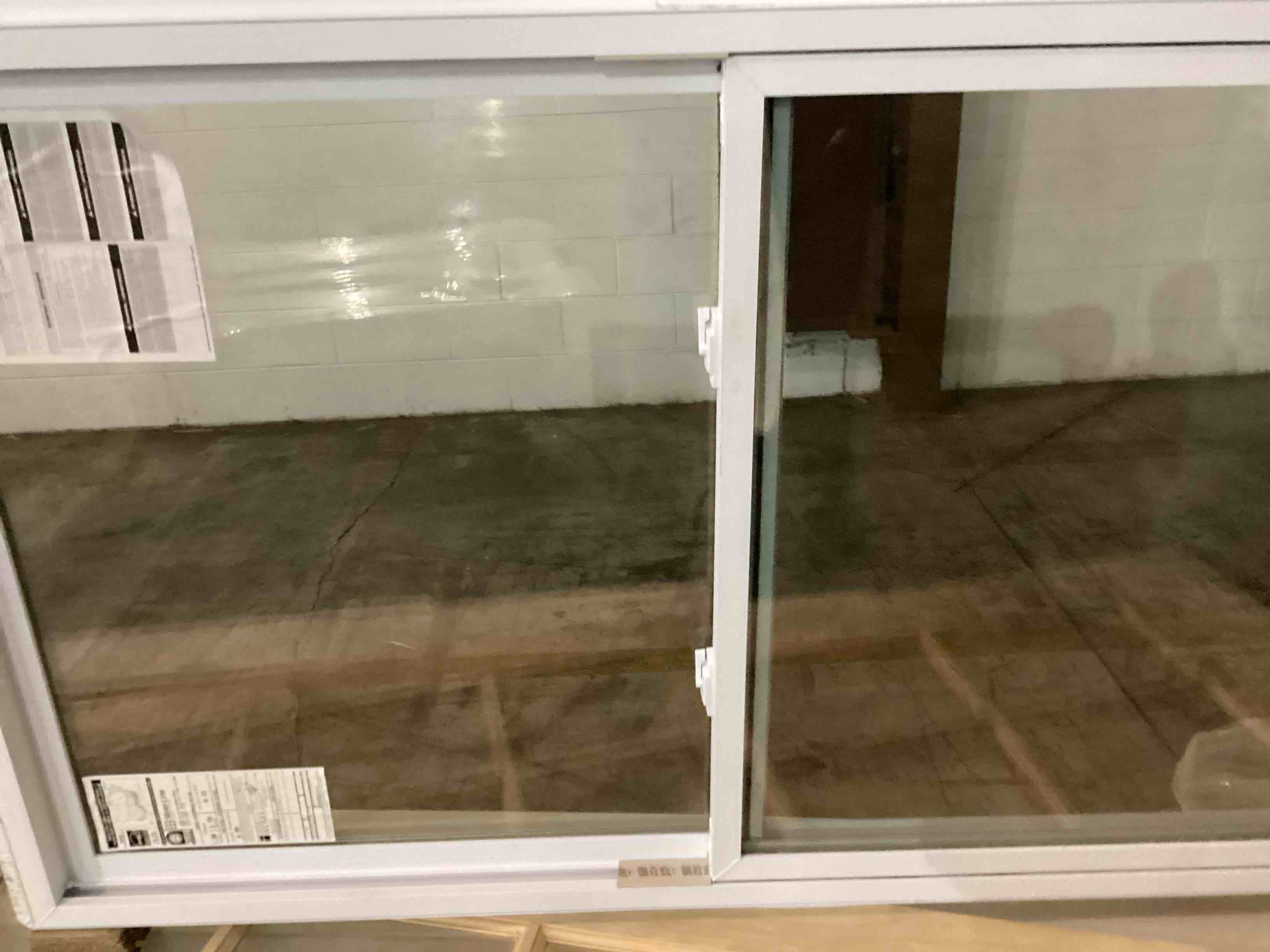 Single Hung Vinyl  Window, a white. 36 in x 60 in.