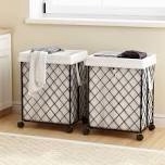 2 white Metal baskets with Handels. can be used for laundry , toys