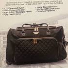 20” Ellen Tracy rolling black quilted duffel bag 