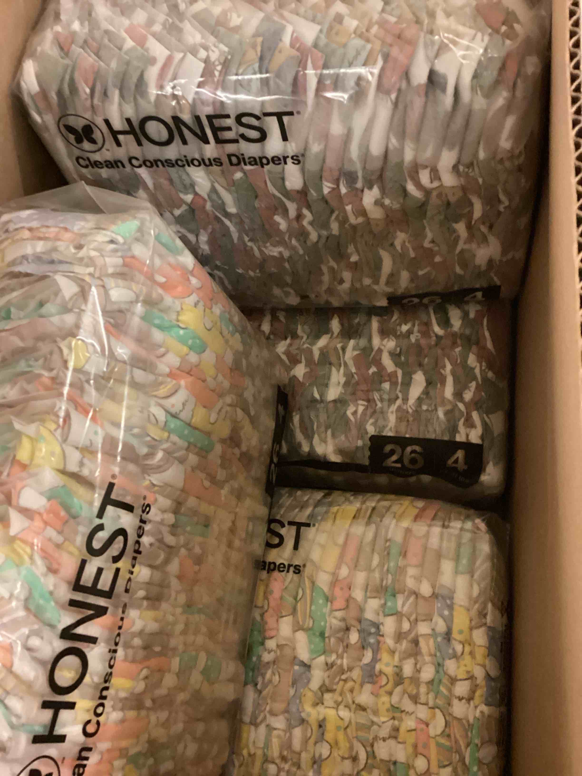 Condition photo showing New/Like New for the honest company comfort dry disposable diapers for sensitive skin, hypoallergenic, big trucks + a