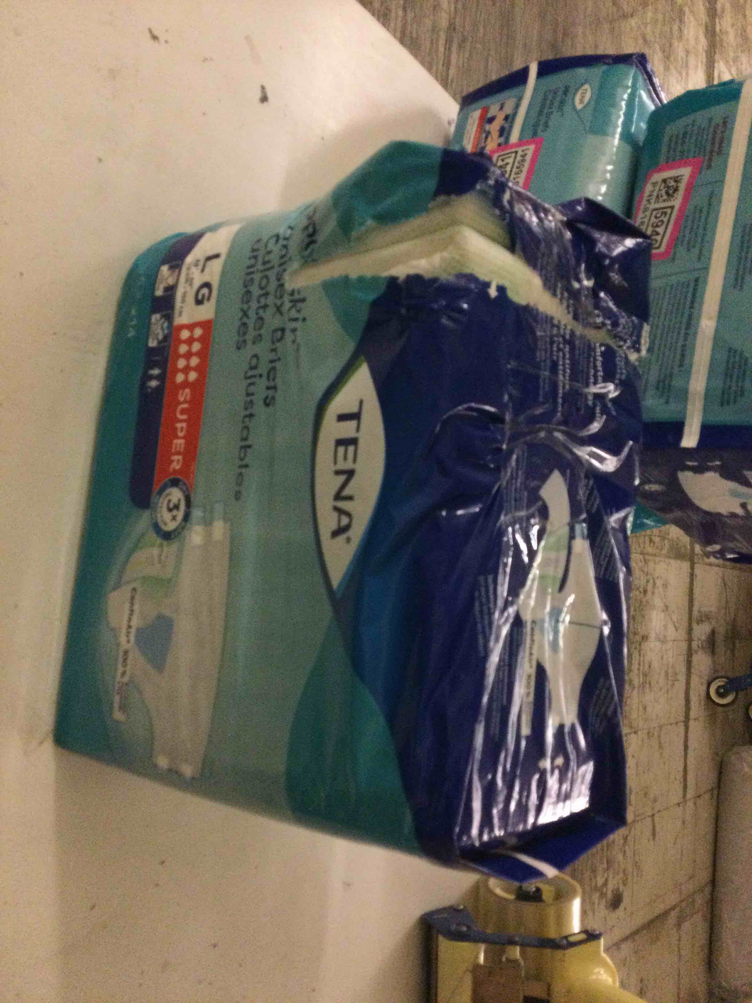 Condition photo showing New/Like New for tena proskin unisex incontinence adult diapers, maximum absorbency, large 14 ct