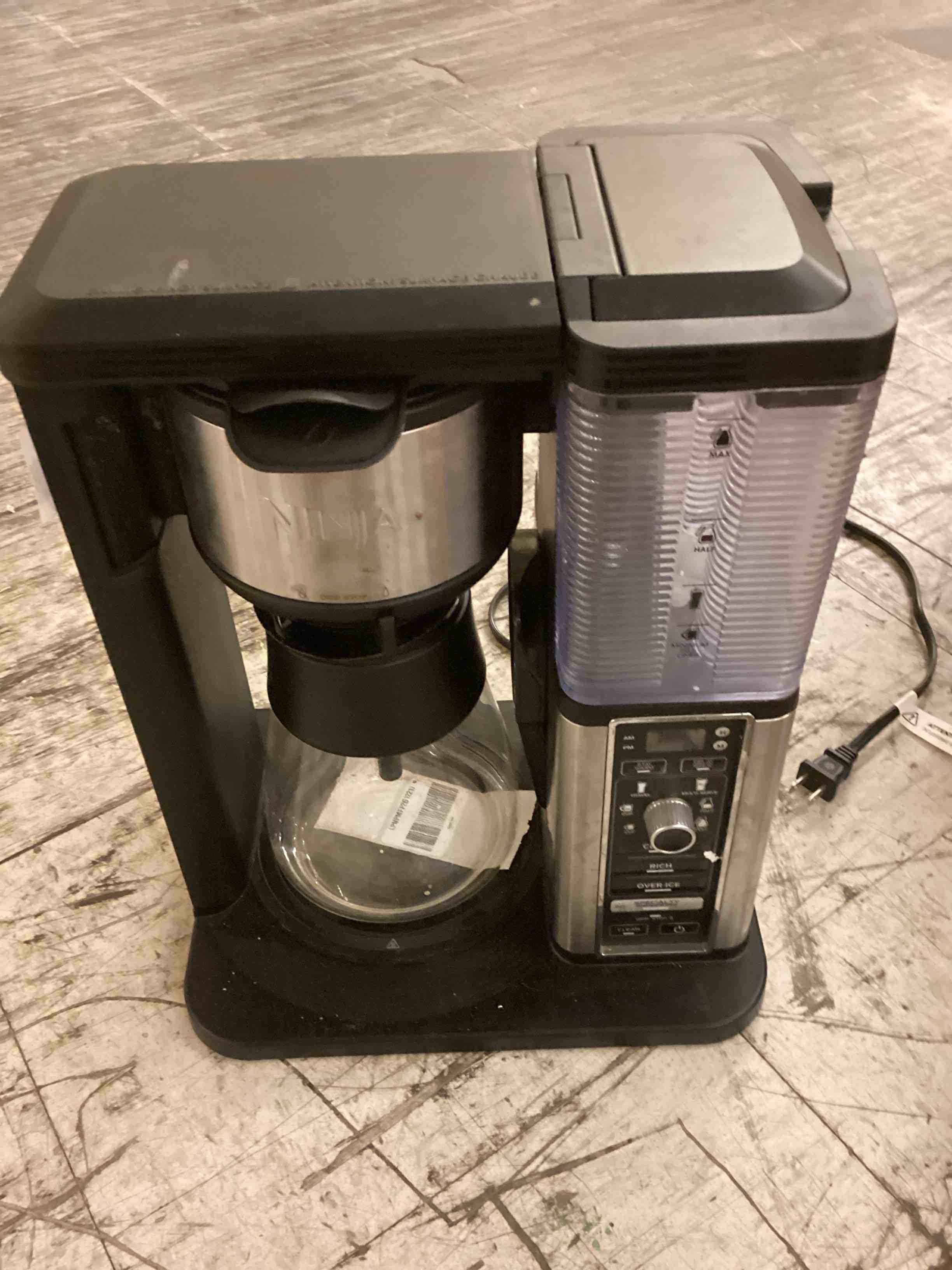 Condition photo showing As Is for ninja specialty coffee maker, hot & iced coffee, 6 brew styles, 8 sizes, small cup to travel mug, 10-cup carafe, fold-away frother, permanent filter, removable reservoir, black, cm401 10 cup