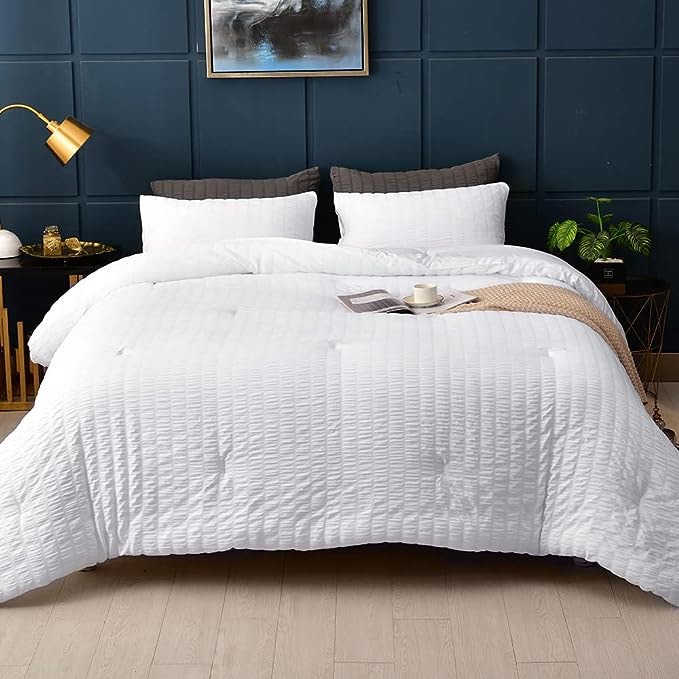 white comforter with feather texture 