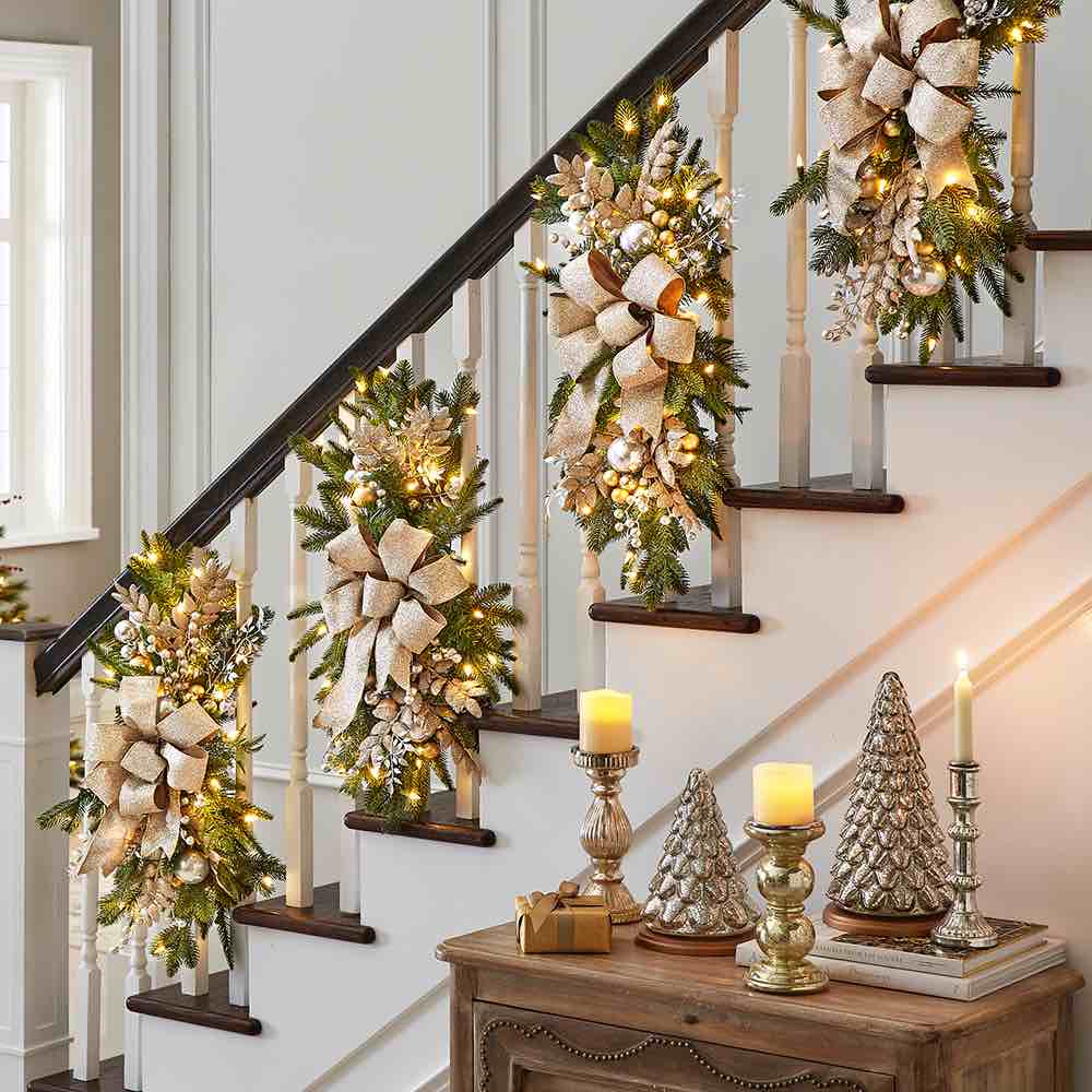 The Cordless Prelit Silver And Champagne Stairway Swag