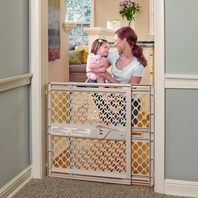Toddleroo by North States Supergate Ergo Child Gate, Baby Gate for Stairs and Doorways. Includes Wall Cups. Pressure or Hardware Mount. Made in USA. (26" Tall, Sand)