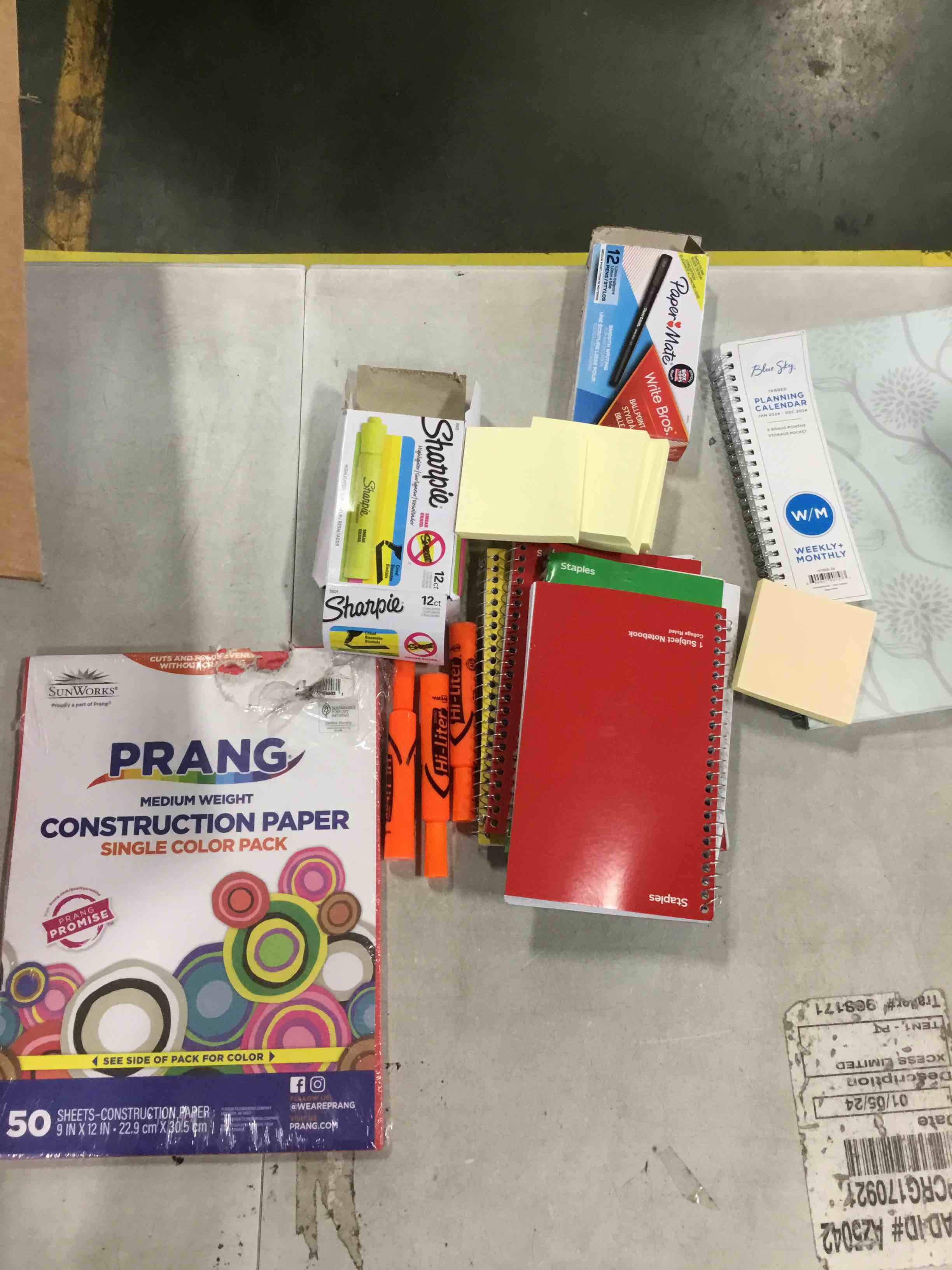 box of assorted office supplies including note books pins binders &more..