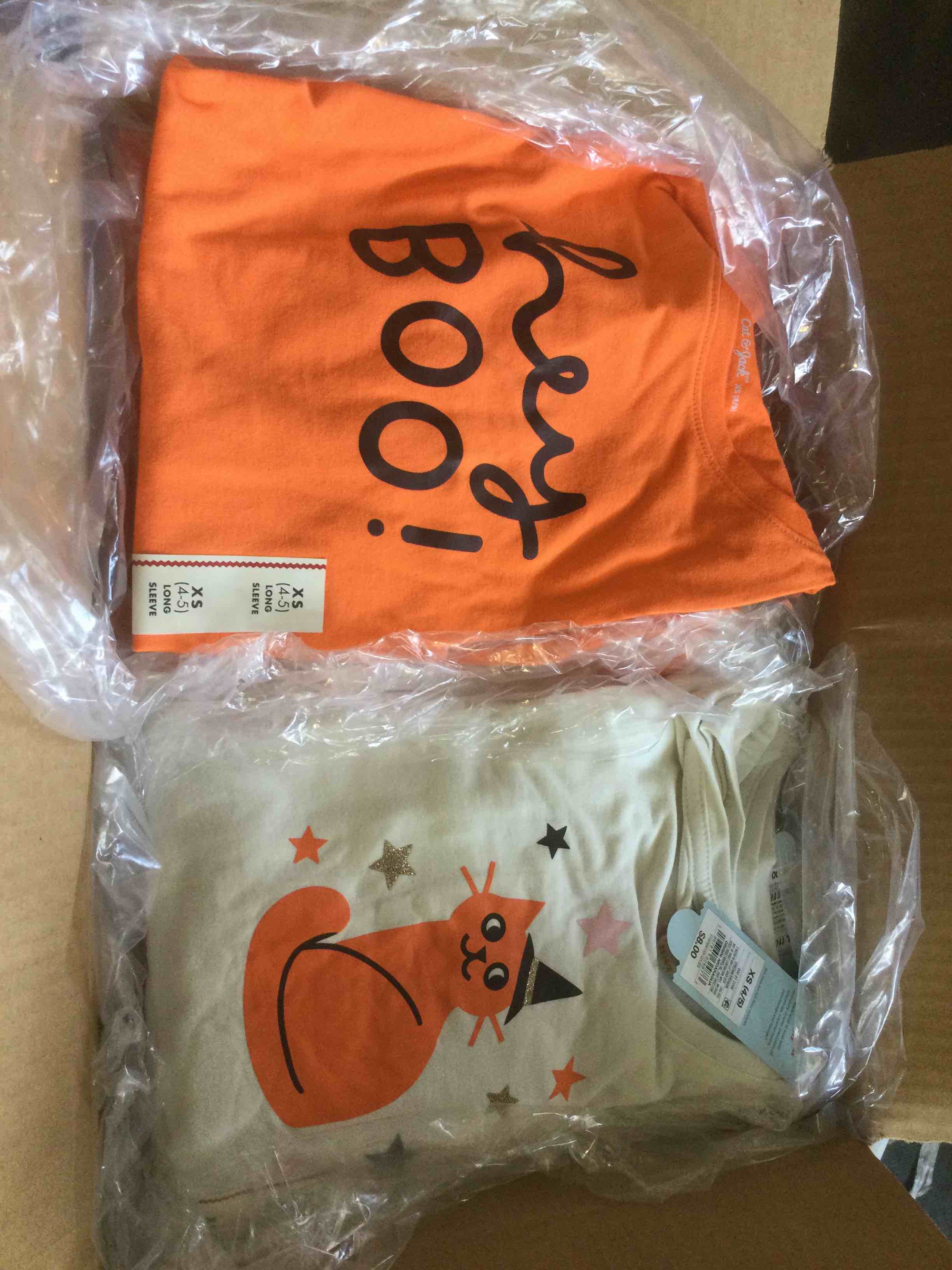 assorted Halloween long sleeve shirts, varying in sizes 