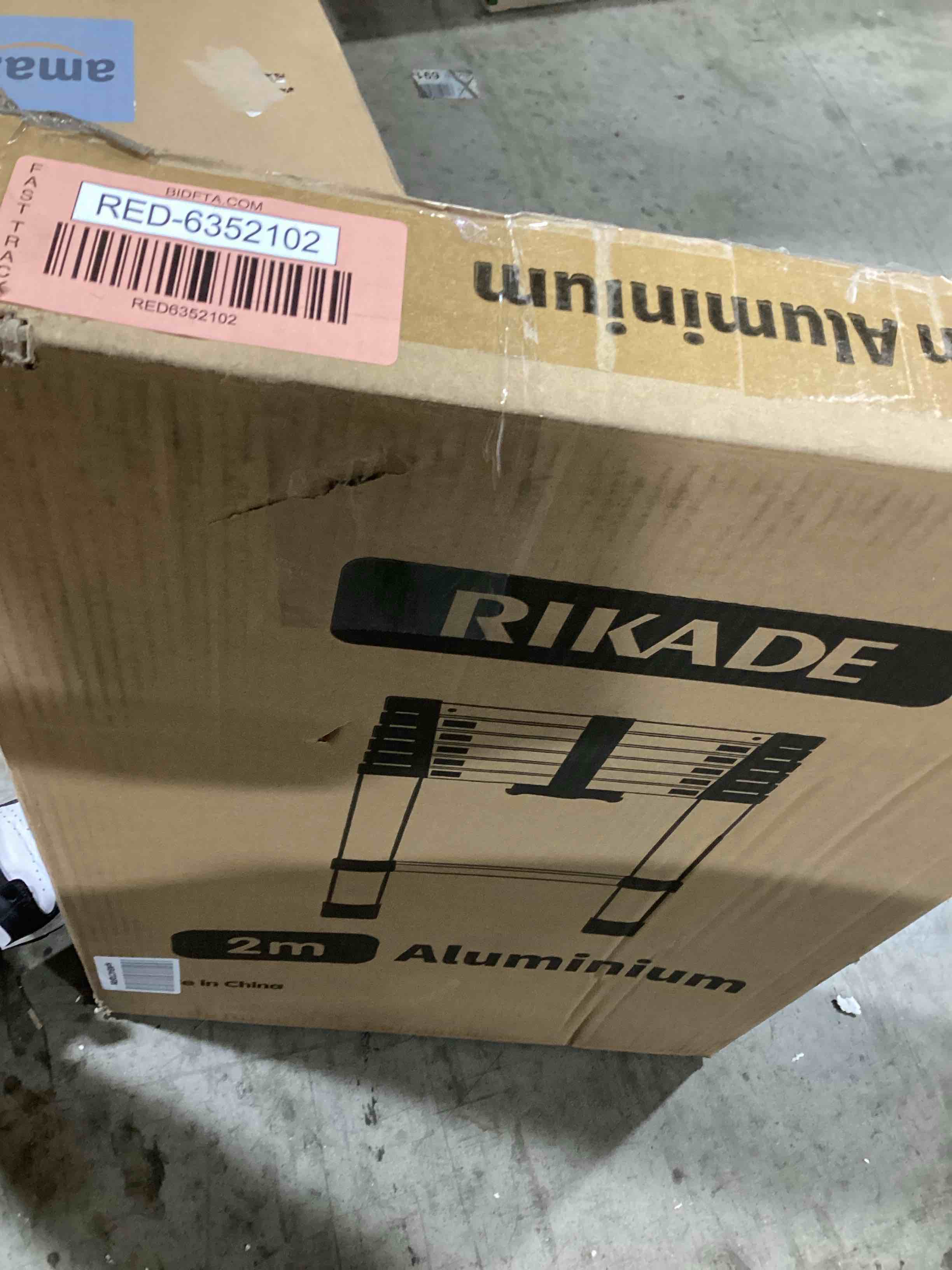 https://s3.amazonaws.com/lotting-images-prod/bidfta/RED6352102_1715172366889.jpeg