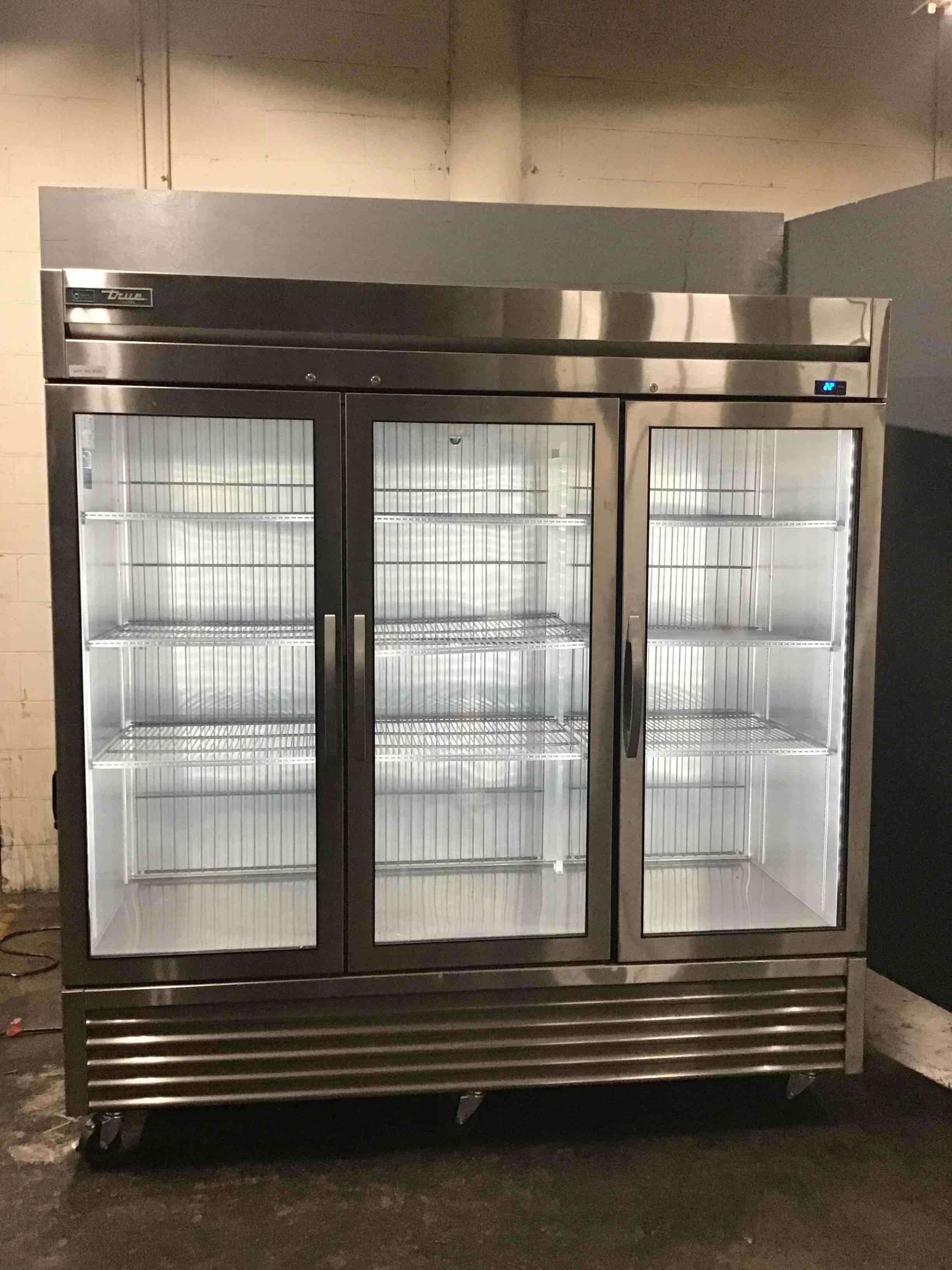 True Stainless Steel Front 72.18 Inch 3 Door Merchandising Freezer On Casters 
