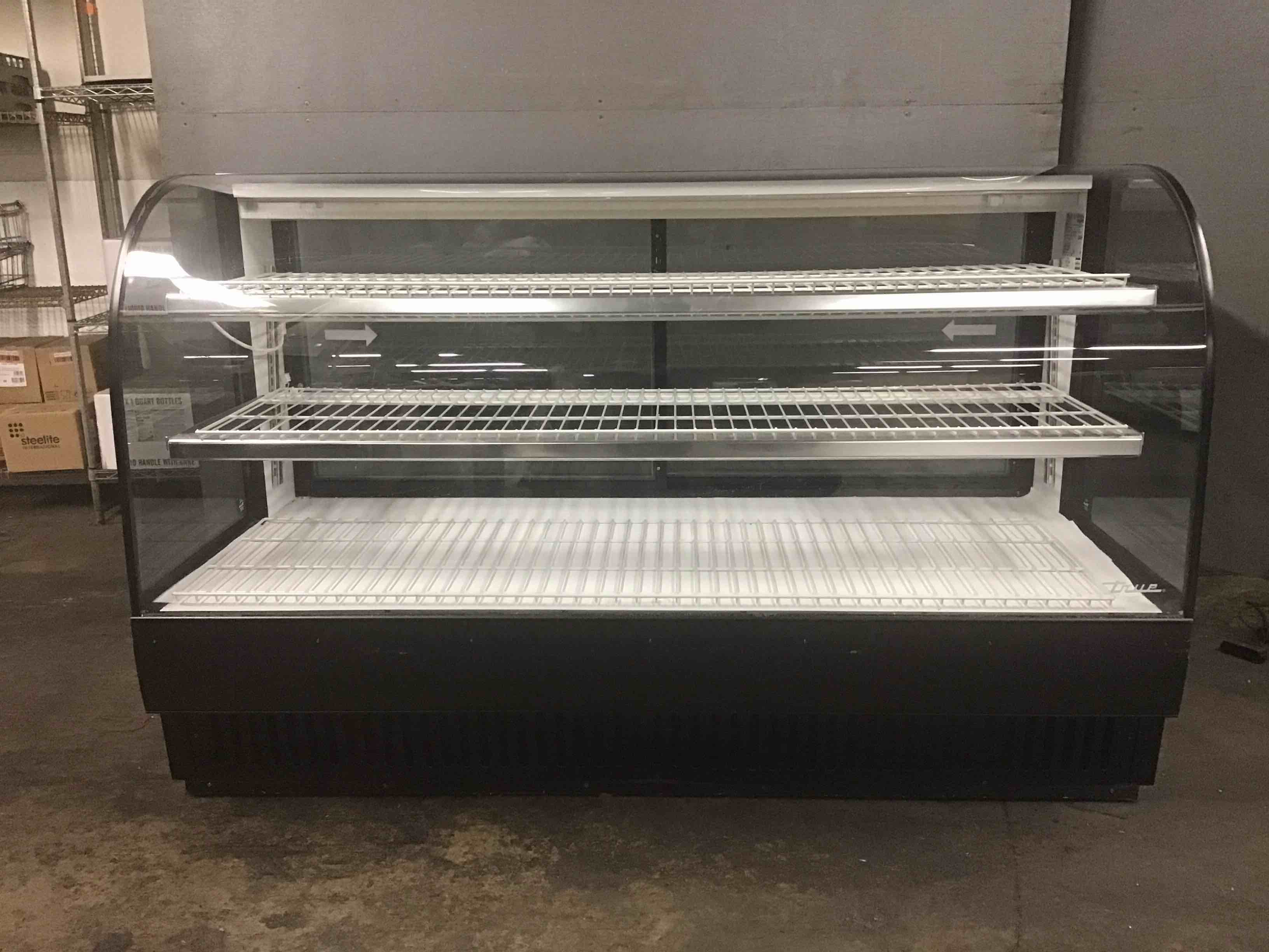 True 77 Inch  Curved Glass Non Refrigerated Dry Bakery Display Case