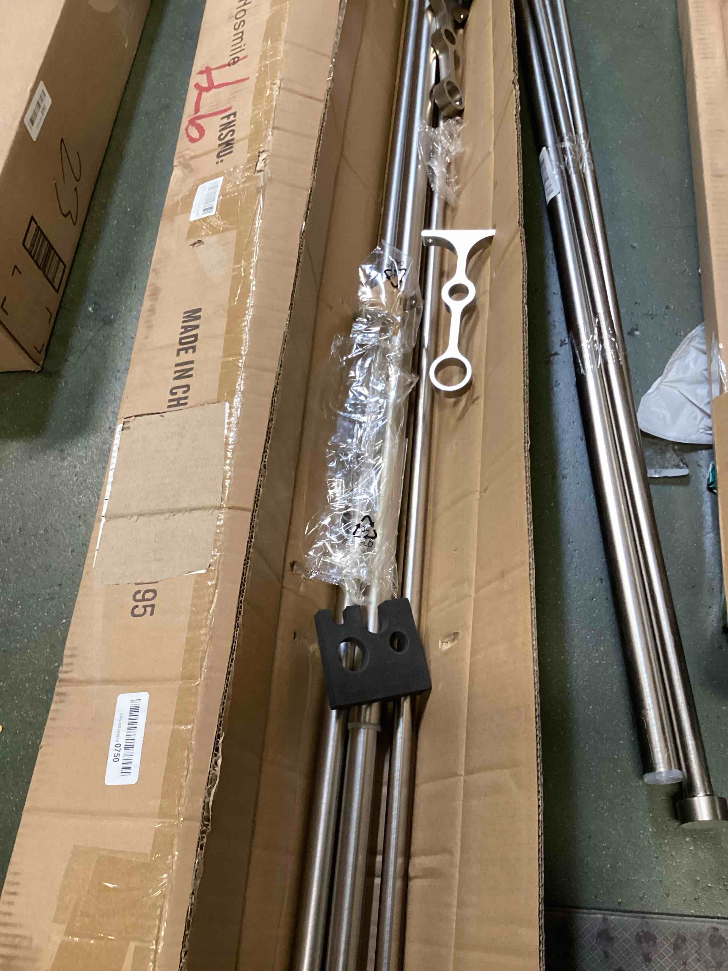 Assortment of Miscellaneous products (May Include cordless shade, curtain rods, retractable baby gate, Led universal linear lamp and more or other use)