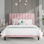 pink upholstered bed