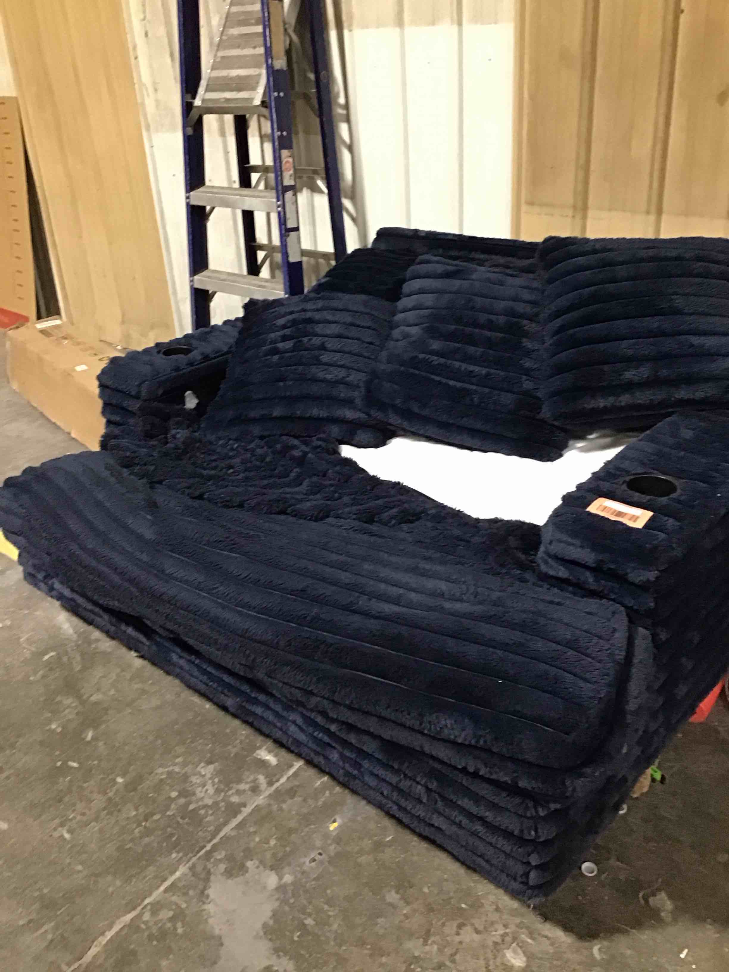 Condition photo showing As Is for blue love seat couch incomplet