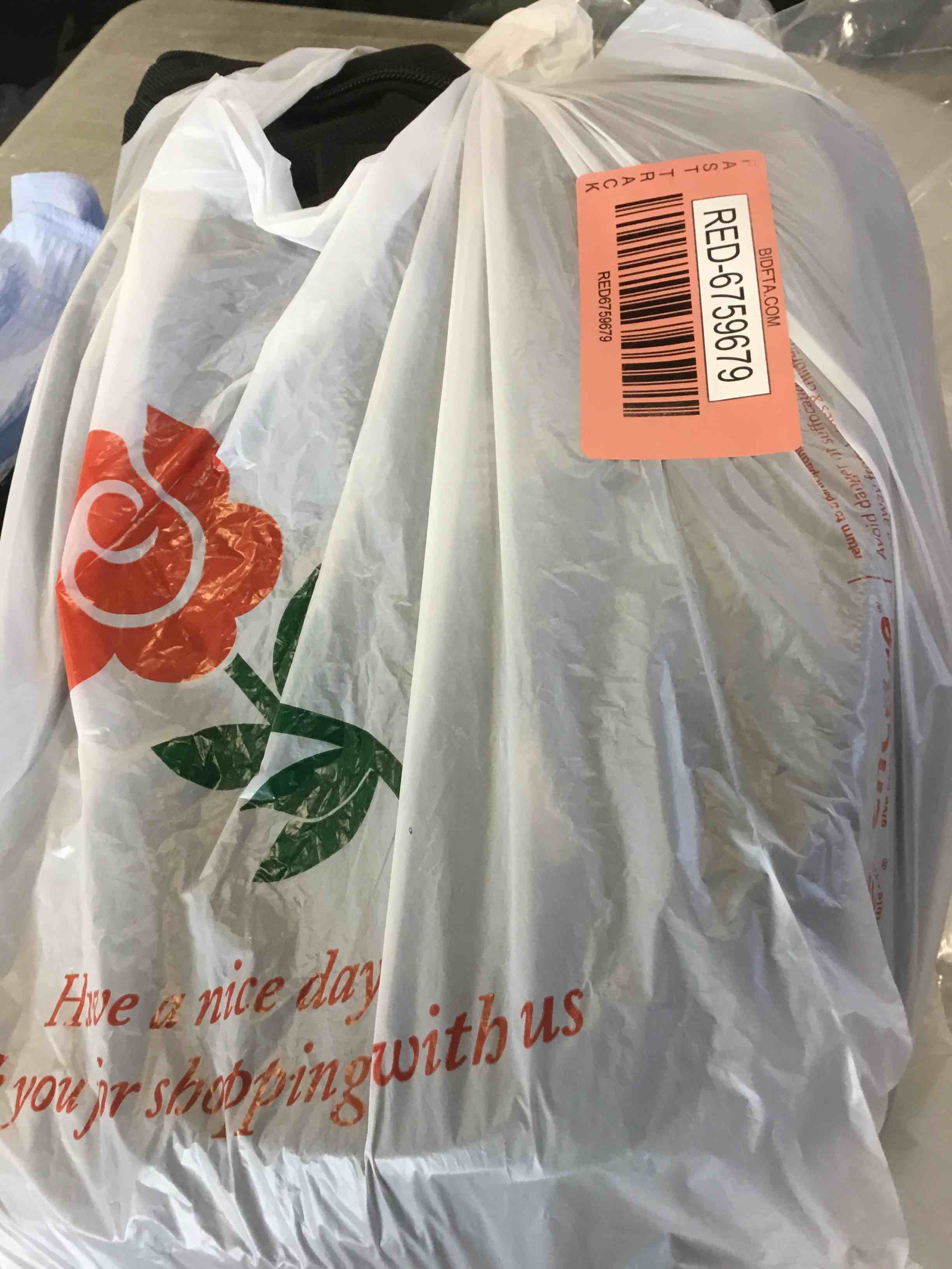 https://s3.amazonaws.com/lotting-images-prod/bidfta/RED6759679_1722952240115.jpeg