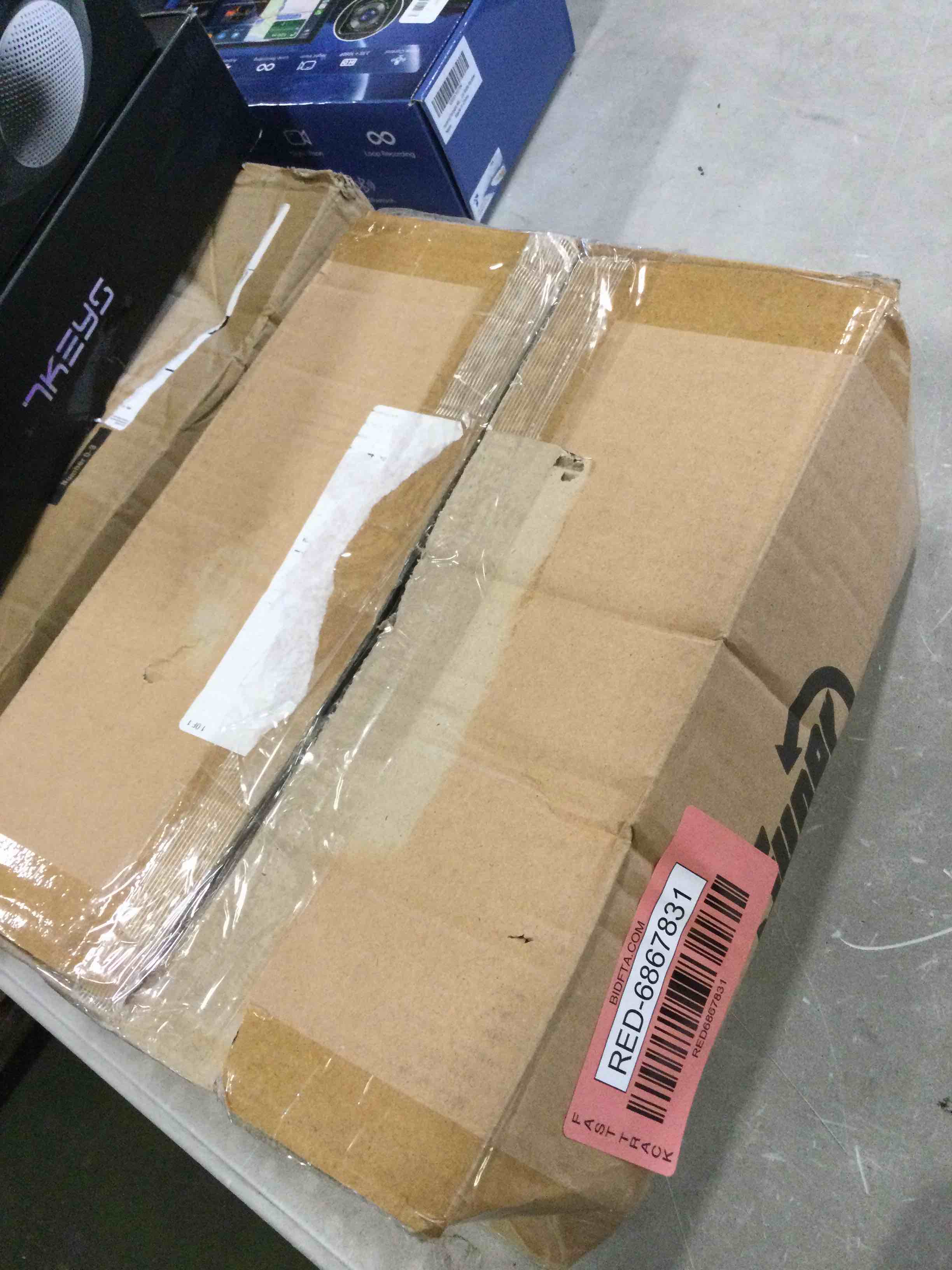 https://s3.amazonaws.com/lotting-images-prod/bidfta/RED6867831_1719598696881.jpeg