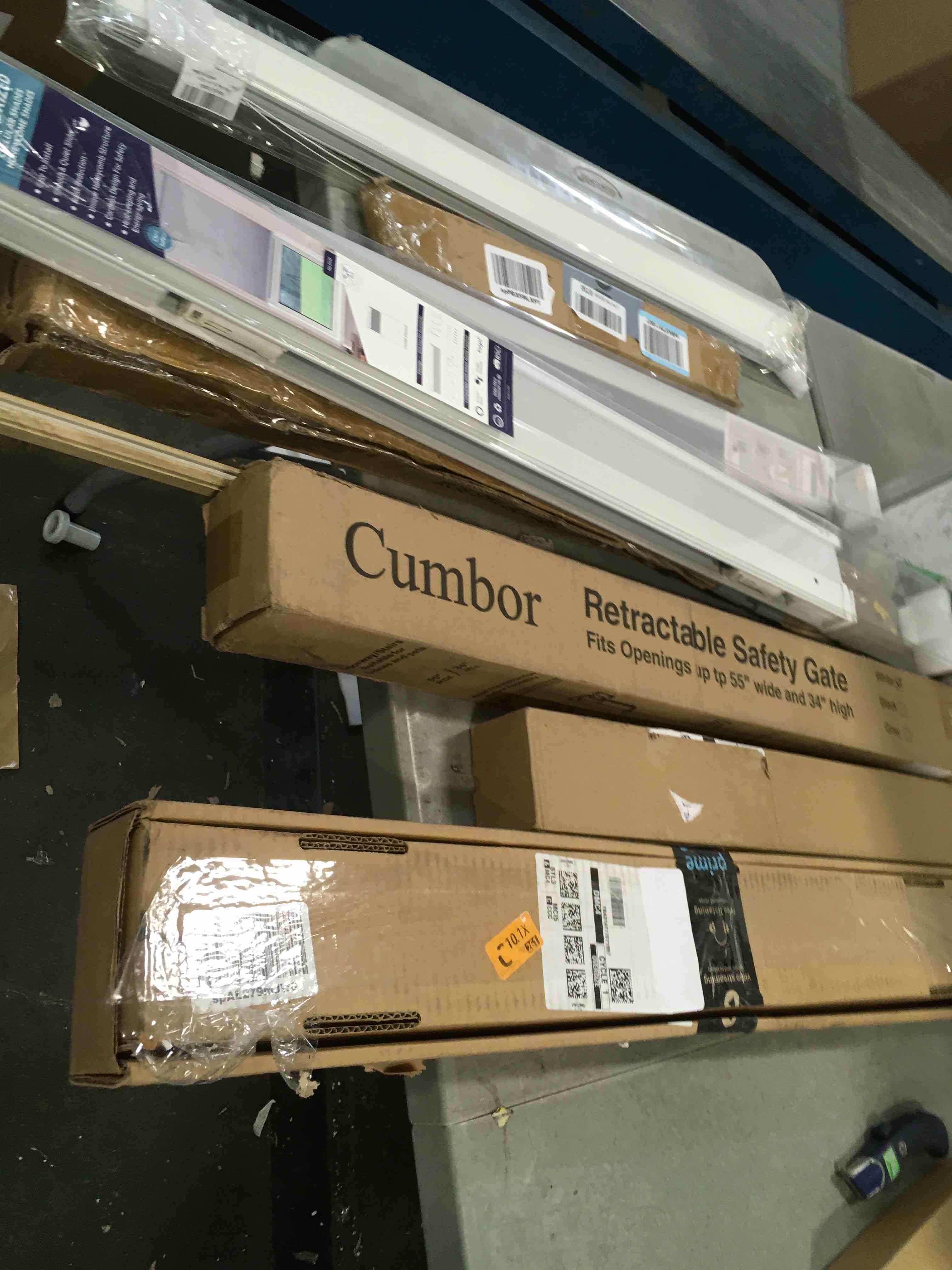 Assortment of Miscellaneous products (May Include cordless shade, curtain rods, retractable baby gate, Led universal linear lamp and more or other use)