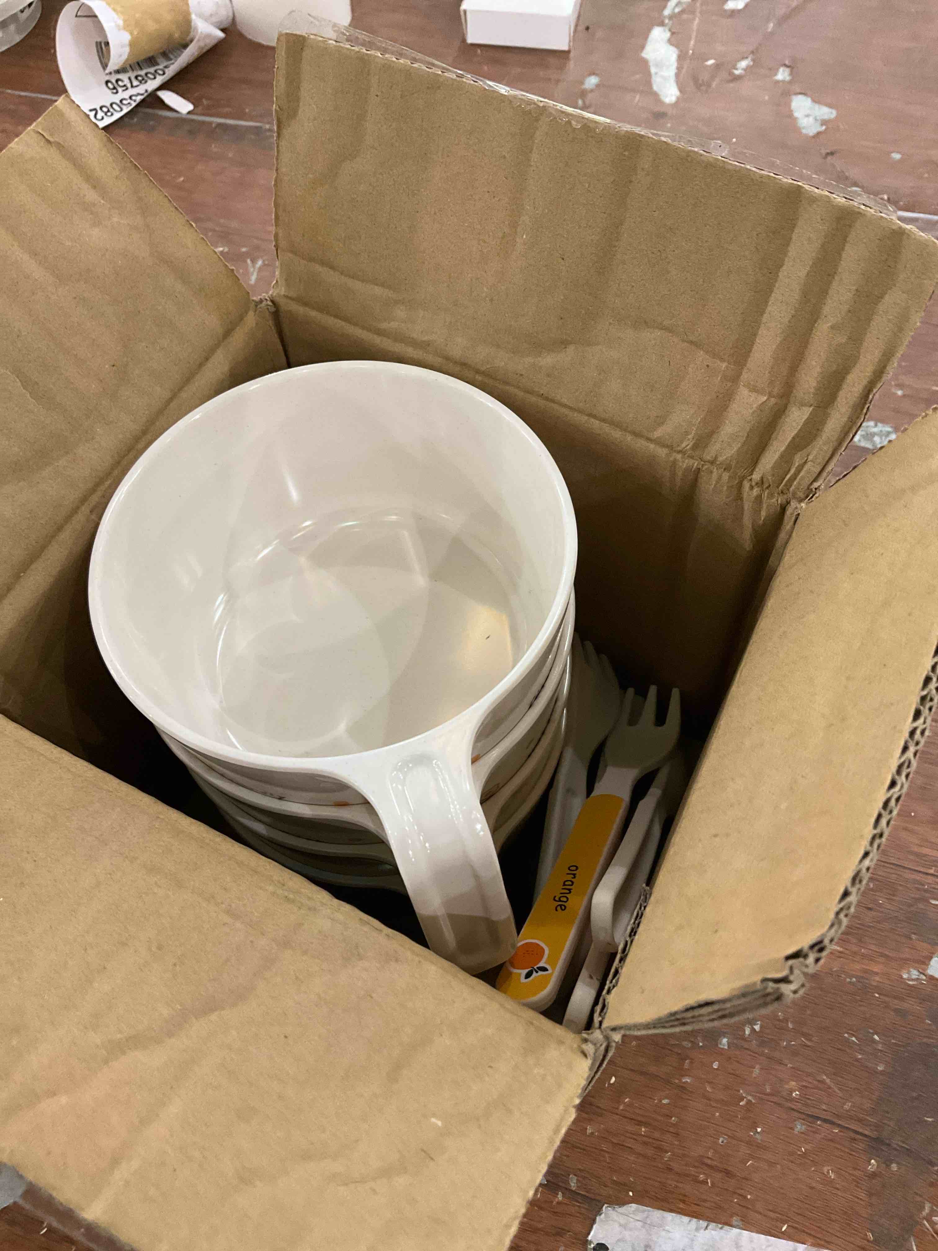 4 soup bowls with forks n spoons 