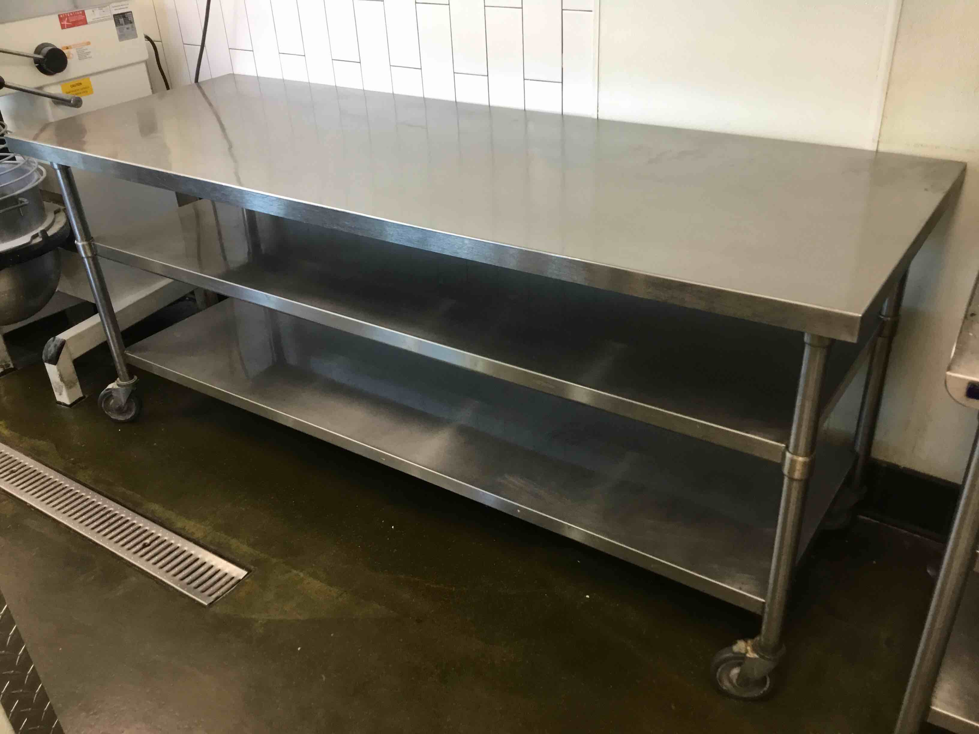 84 Inch Stainless Steel Table With Under Shelves On Casters 