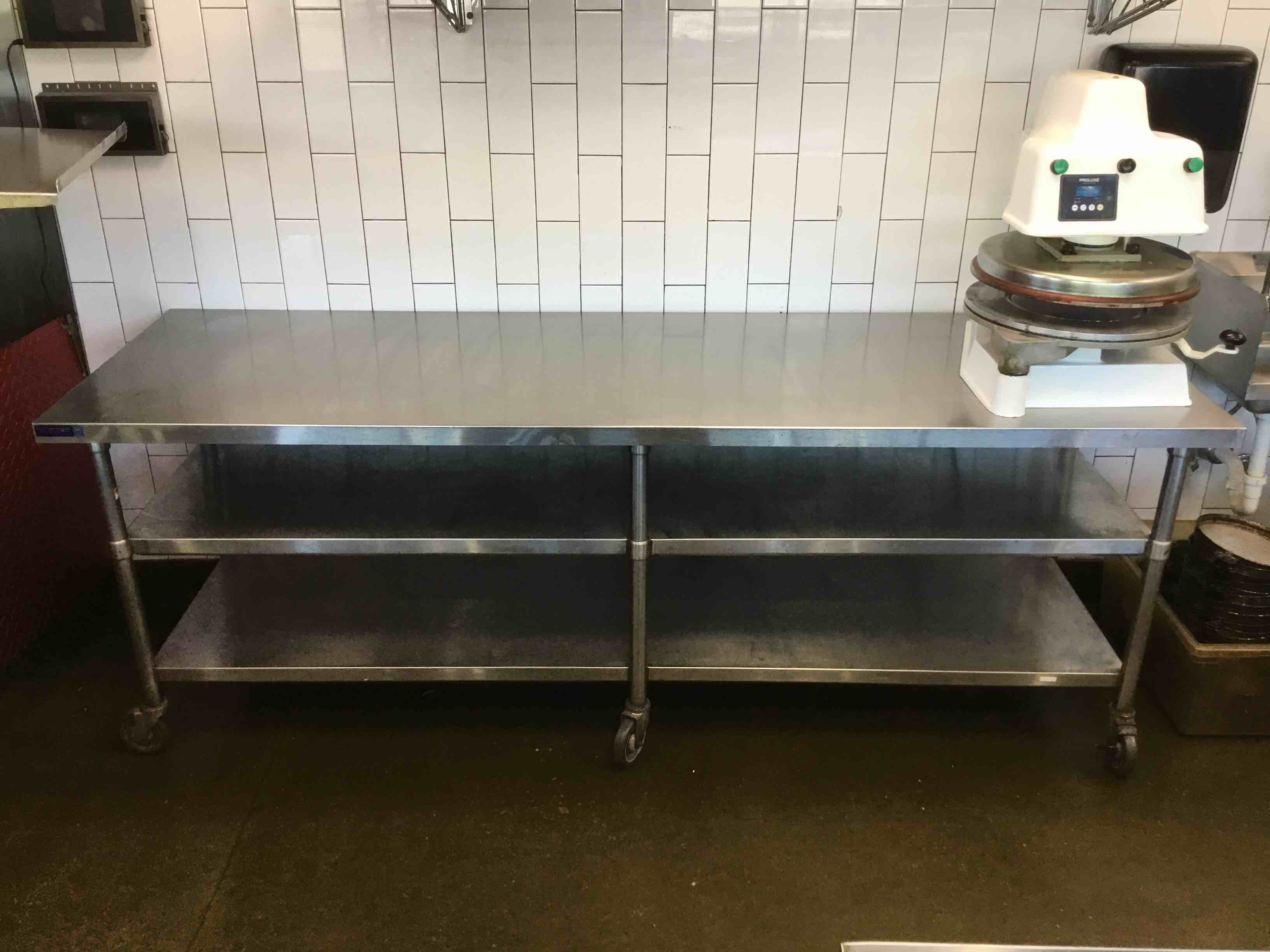 96 Inch Stainless Steel Table With Under Shelves On Casters 