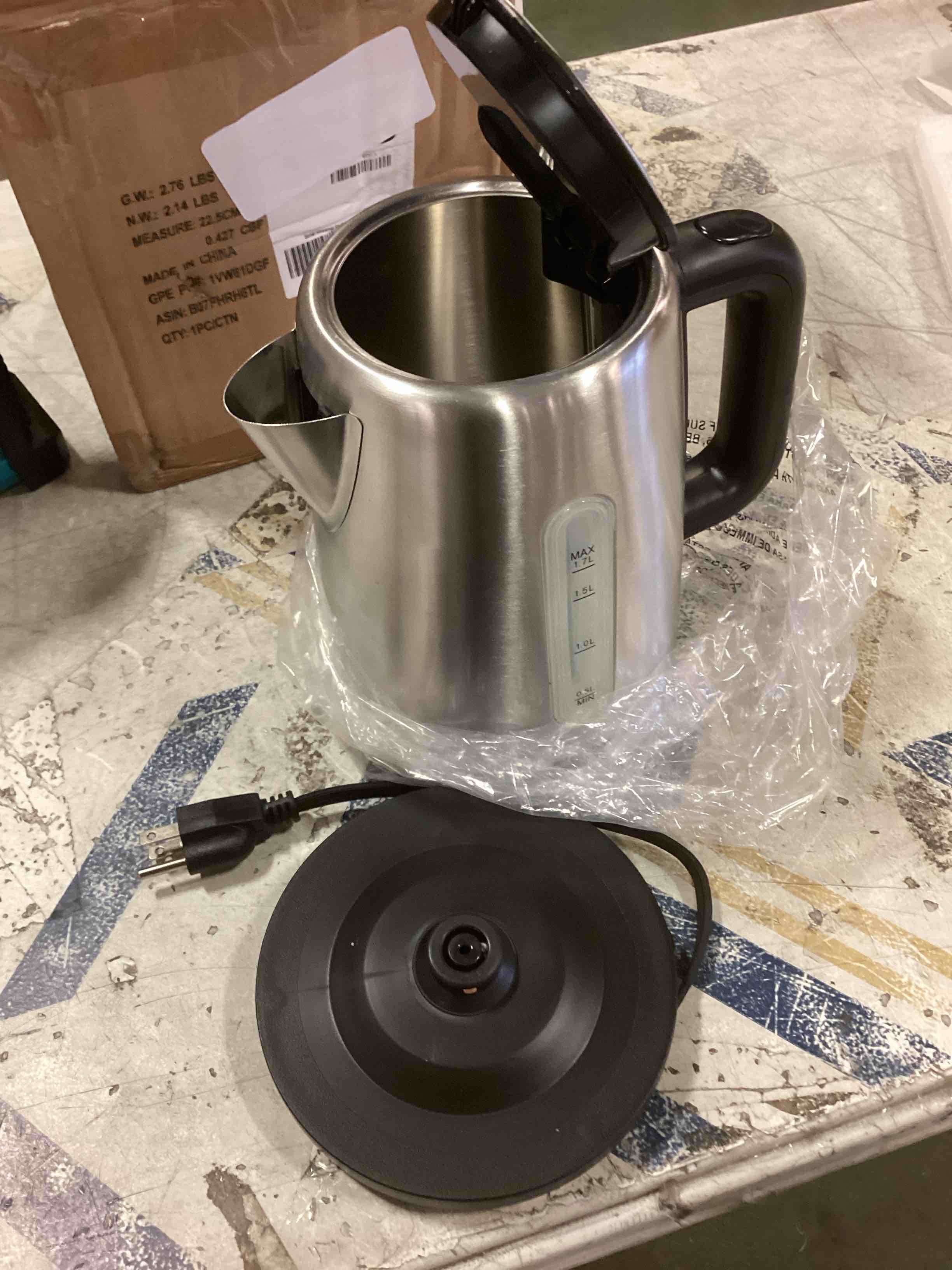 https://s3.amazonaws.com/lotting-images-prod/bidfta/TEA0339215_1727977357184.jpeg