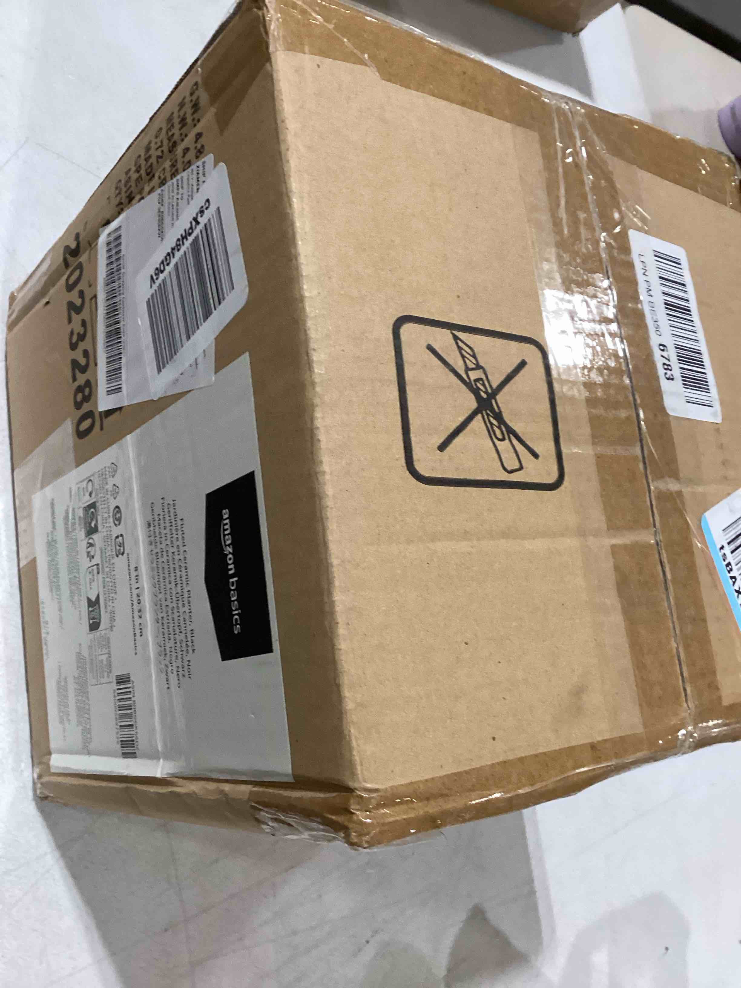 https://s3.amazonaws.com/lotting-images-prod/bidfta/TEA0392325_1730288631201.jpeg
