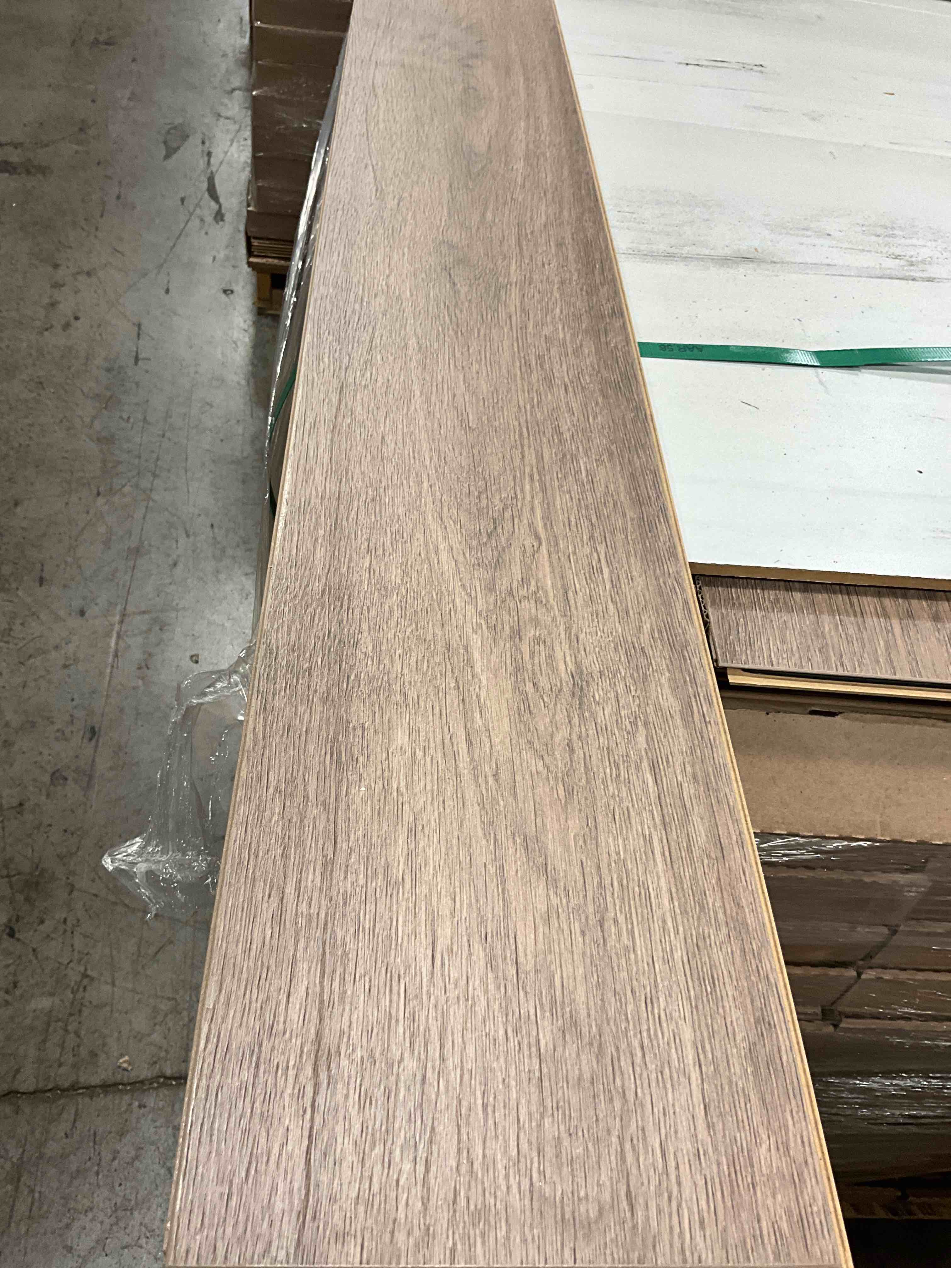 55 boxes, 1,308.39 sq. ft., 7.5 x 50.75, 7mm, laminate flooring, your bid per sq. ft.