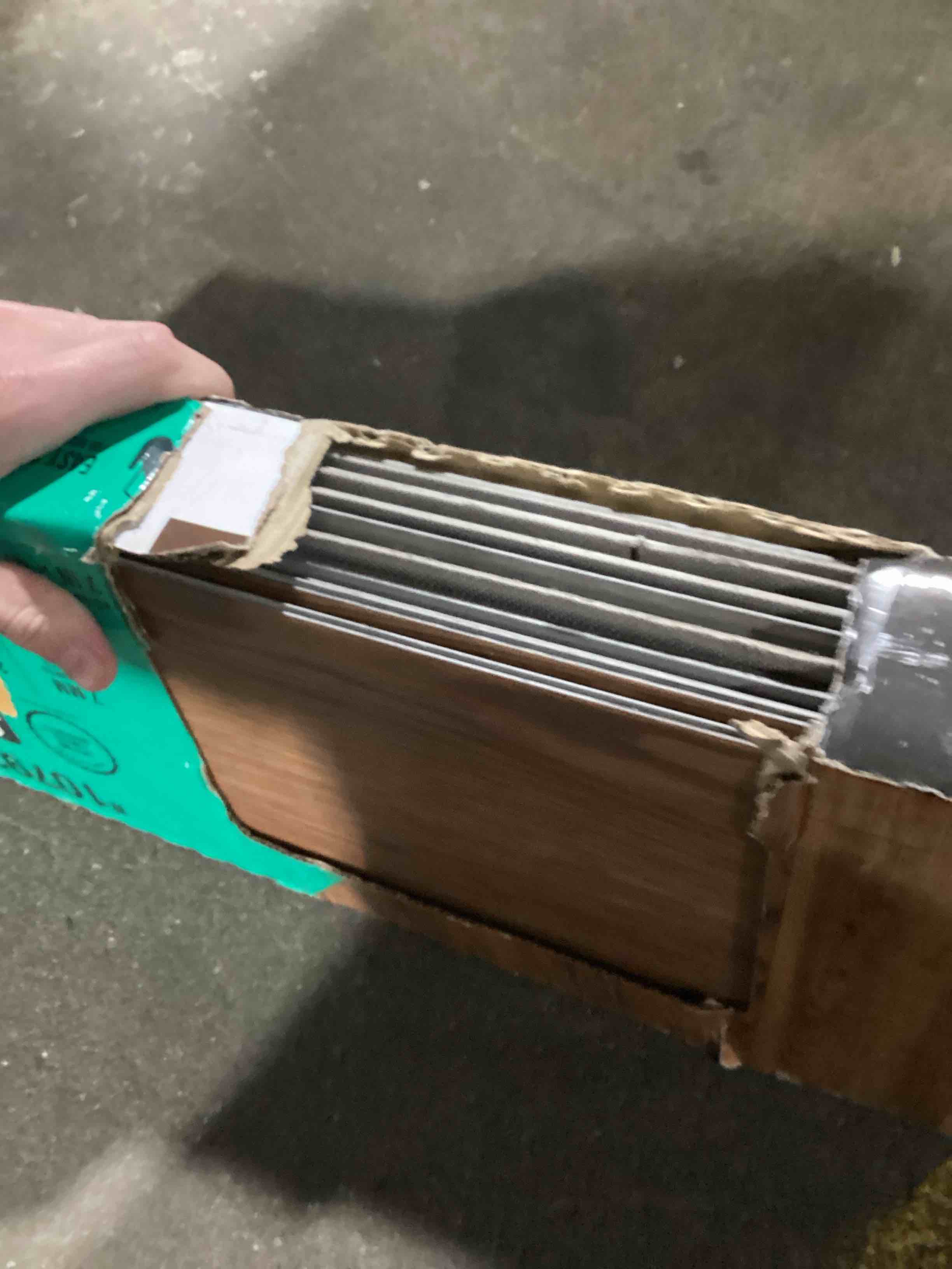 STAINMASTER PetProtect Honeycomb Brown 20-mil x 7-in W x 48-in L Waterproof Interlocking