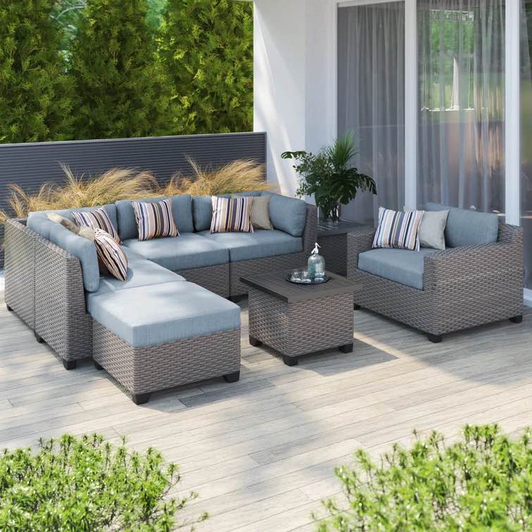 Amjad 8 Piece Rattan Seating Group with Sunbrella Cushions *incomplete, armless chair only* *similar to stock photo, cushions may be different color* 