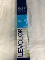 LEVOLOR Trim+Go Cellular Shade in the color Snow. It is a light-filtering, cordless shade designed for easy installation and use. Key details include:  Dimensions: 30 inches wide by 72 inches long (76 cm x 183 cm).  Features: Cellular design for energy efficiency.  Light filtering to soften light while maintaining privacy.  Cordless operation for safety and ease of use.  Trim+Go feature allows for in-store sizing for a precise fit.  Color: Snow. Model Number: #2893587. 