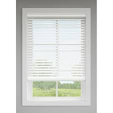 Levolor 2.5-inch Faux Wood Blinds. Key details include:  Product: Levolor 2.5-inch Faux Wood Blind Material: Faux wood (NuWood), which is moisture-resistant and won't warp or crack. Features: Cordless design for safety and a clean look. Room darkening. Privacy slats. Color: White. Size: Common 31-inch width, actual 30.5-inch width x 72-inch length. Control: Wand tilt. Installation: Includes all hardware. Model Number: #929846.