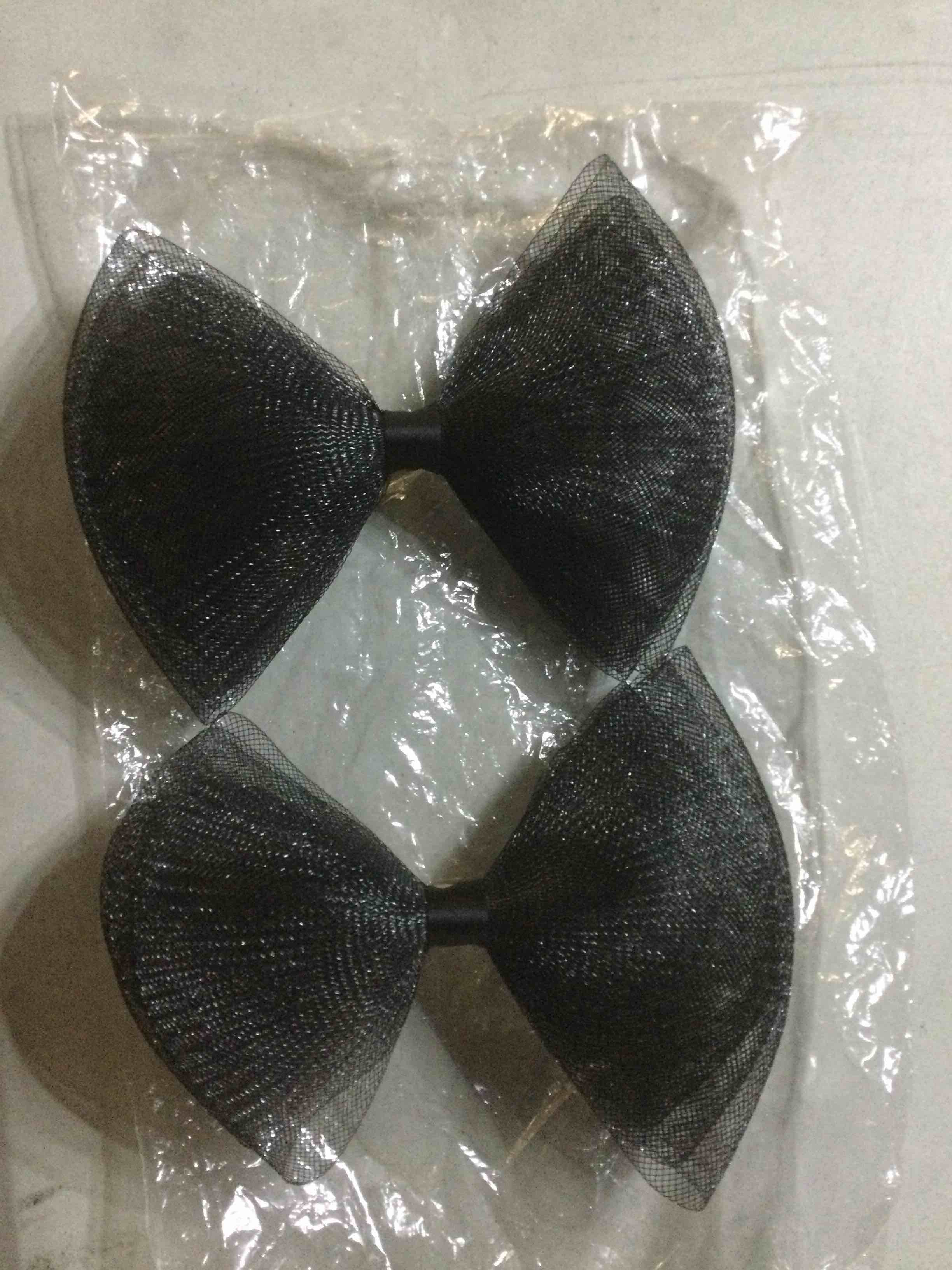 pair of black mesh bow ties with clips