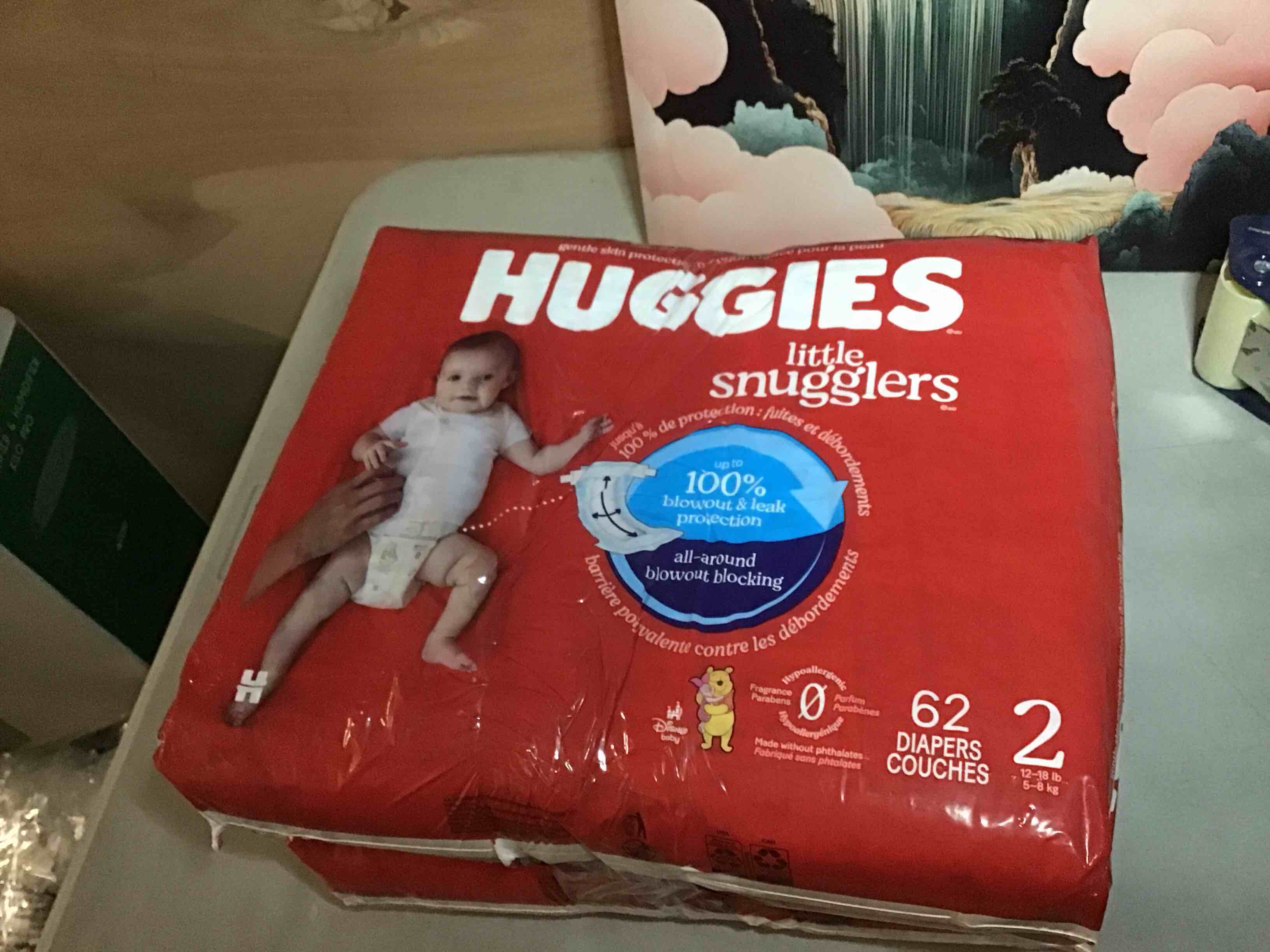 Condition photo showing New/Like New for Huggies Little Snugglers Baby Diapers Size 2, 62 Count