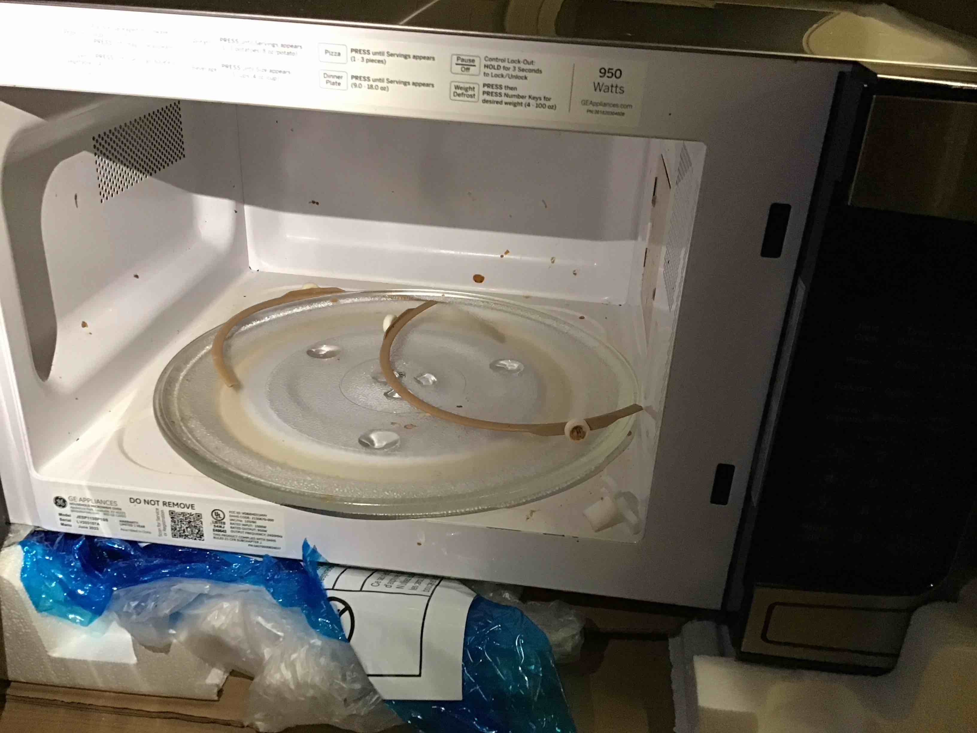 Condition photo showing As Is for GE JESP113SPSS Countertop Microwave Oven | 1.1 Cubic Feet Capacity, 950 Watts | Kitchen Essentials for the Countertop or Dorm Room | Stainless Steel 1.1 Cubic Ft. Stainless Steel