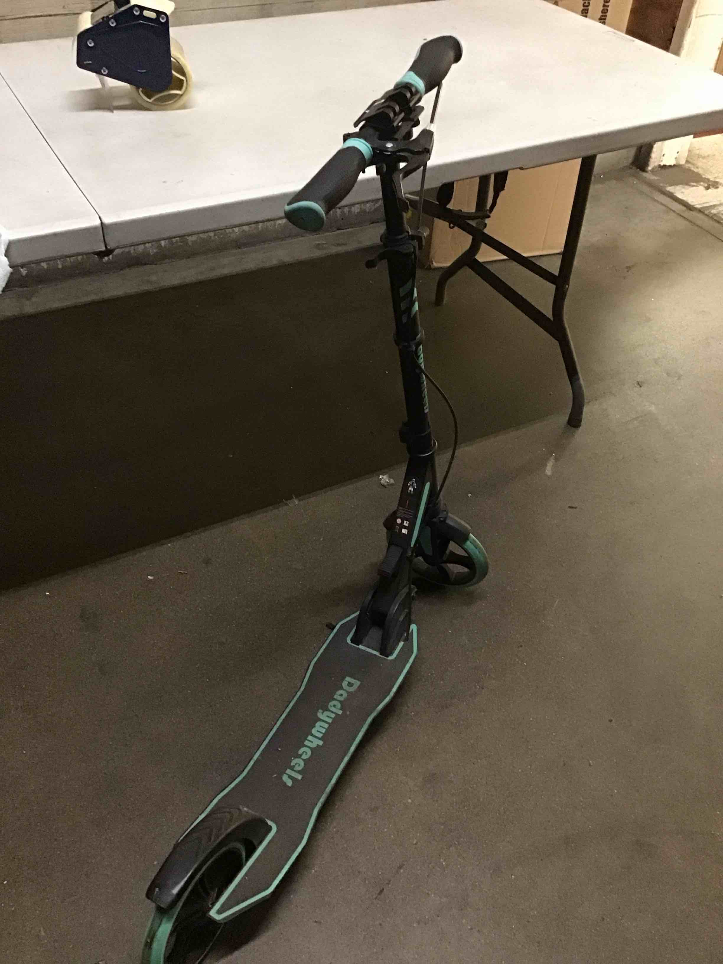 Condition photo showing As Is for Kick Scooter for Adults, Teens & Kids Ages 6+ | with 8 Inch Large Wheels, Hand Brake and Suspension | Adjustable Height, Foldable, Holds Up to 220lbs | Included Carry Straps & Bags Aqua