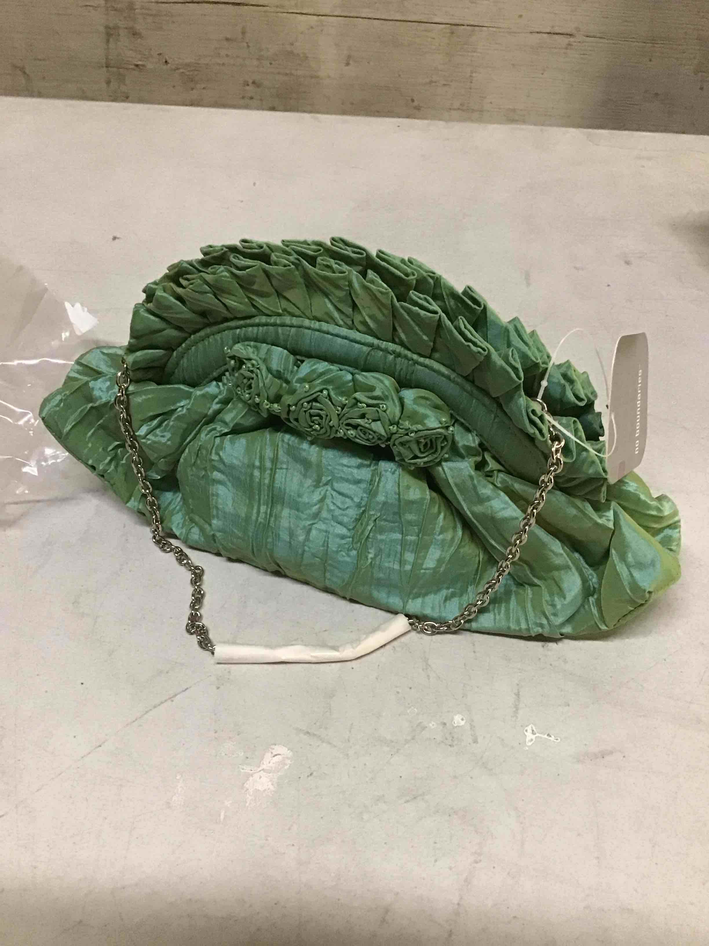 Condition photo showing New/Like New for  Ruffled green taffeta evening purse with a floral applique and a silver chain strap