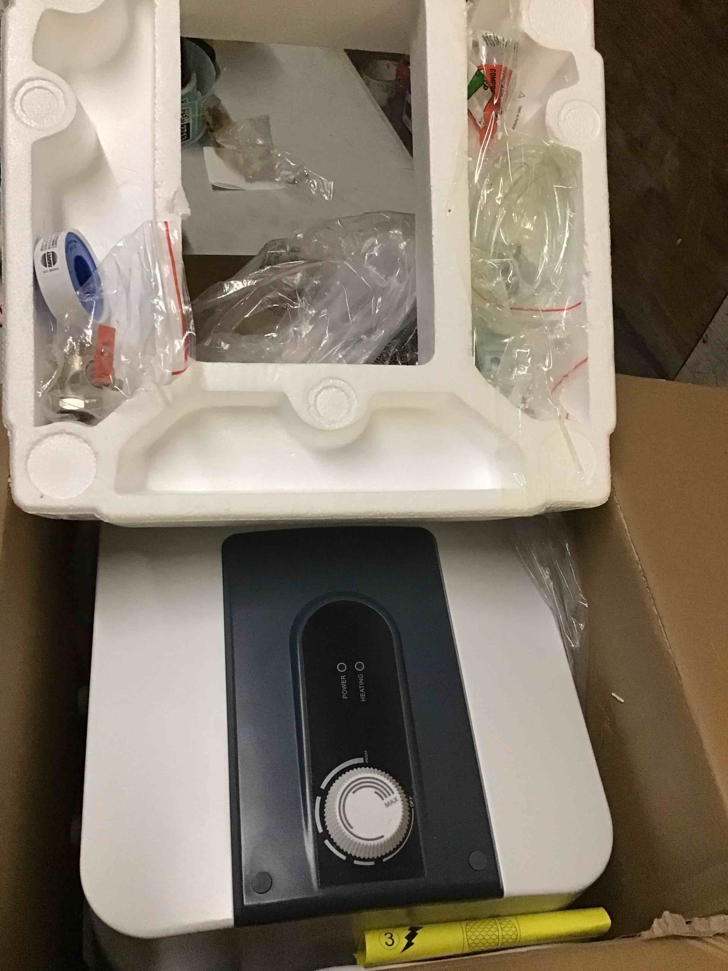 Condition photo showing As Is for Electric Mini Tank Water Heater, 2.64Gallon Under Sink On Demand Hot Water Heater, Wall or Floor Mou