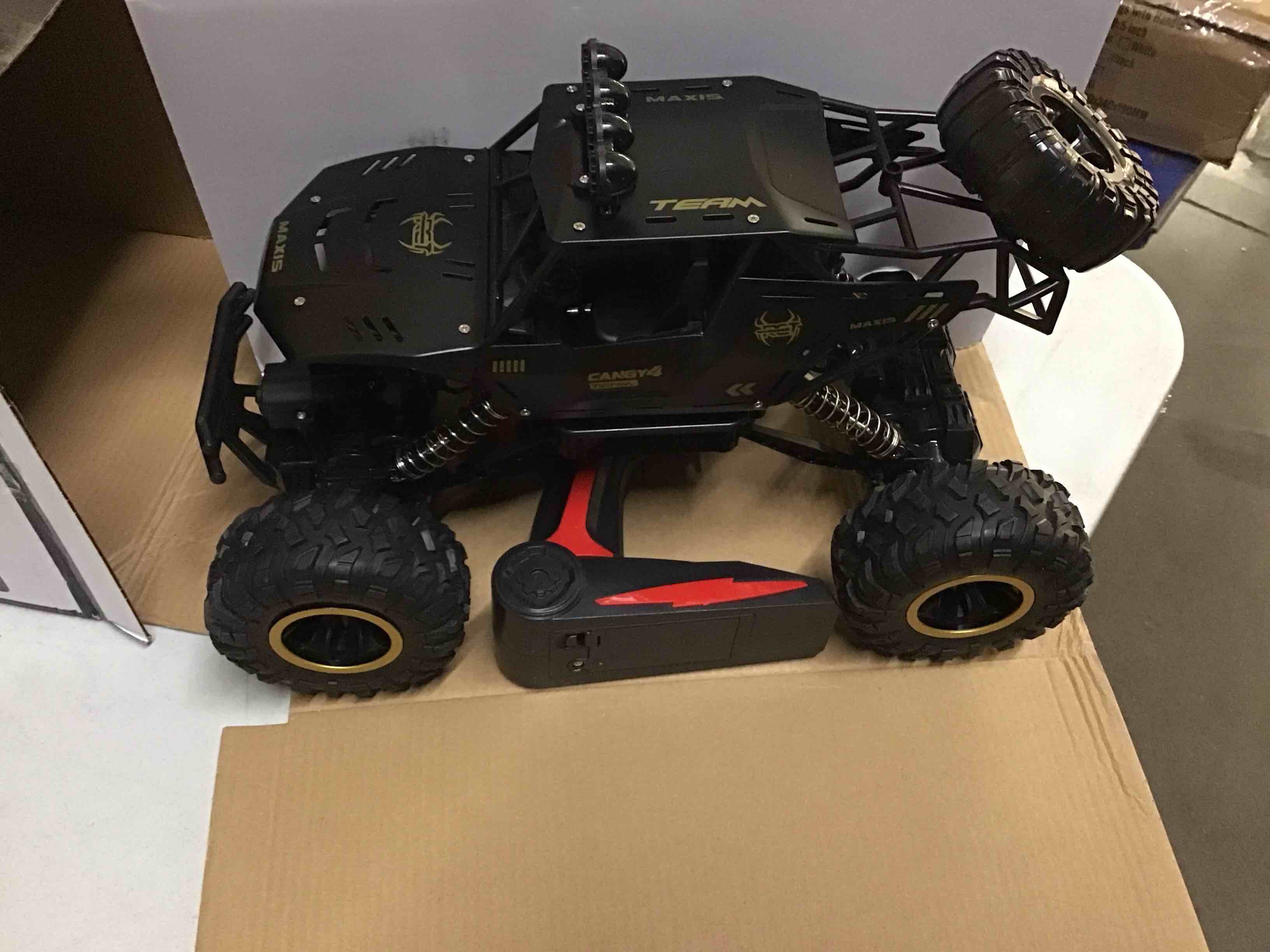 Condition photo showing Good Condition for RC Cars Remote Control Car 1:12 Off Road Truck, Metal Shell LED Headlights Offroad Monster RC Truck, 4x4 All Terrain Hobby RC Cars Toys for Boys Kids Adults Gifts 8-12 Black