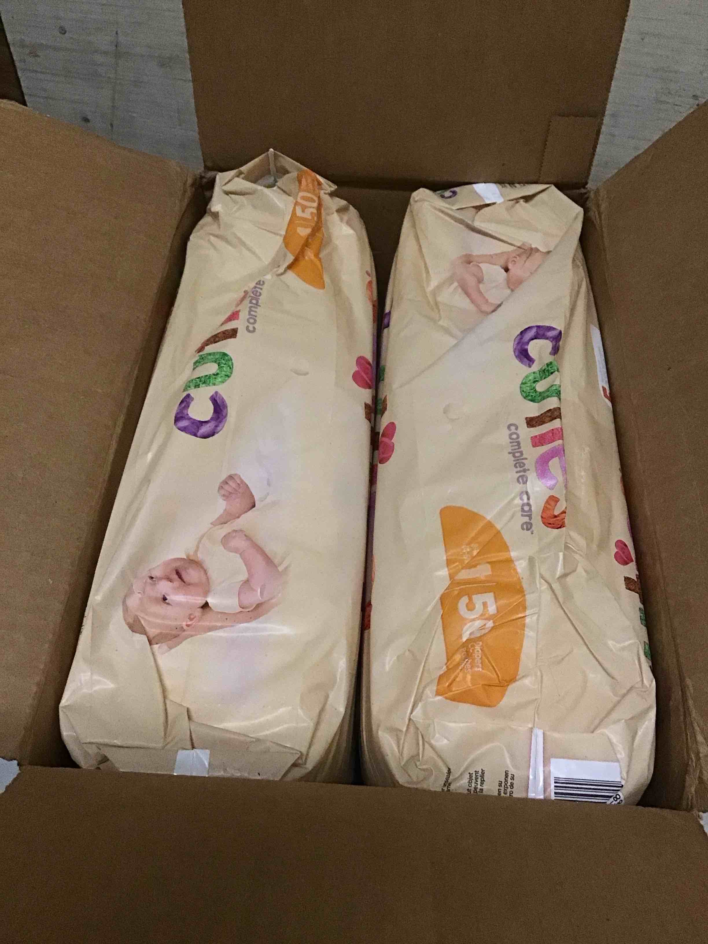 Condition photo showing New/Like New for Cuties Baby Diapers, Size 1, 50 Diapers, Pack of 4